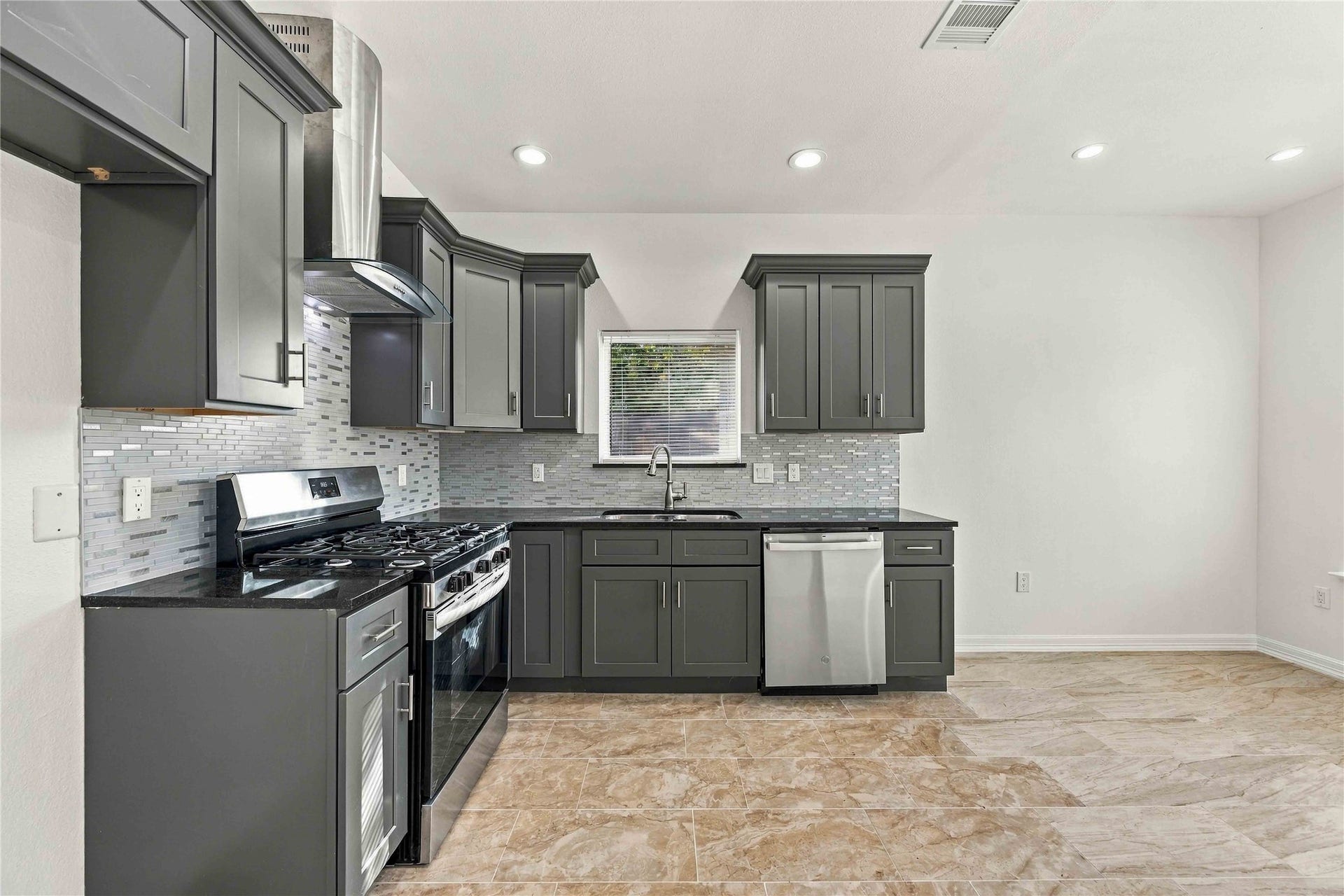 8147 Chateau Street, Houston, TX 77028 Kitchen with stainless steel appliances
