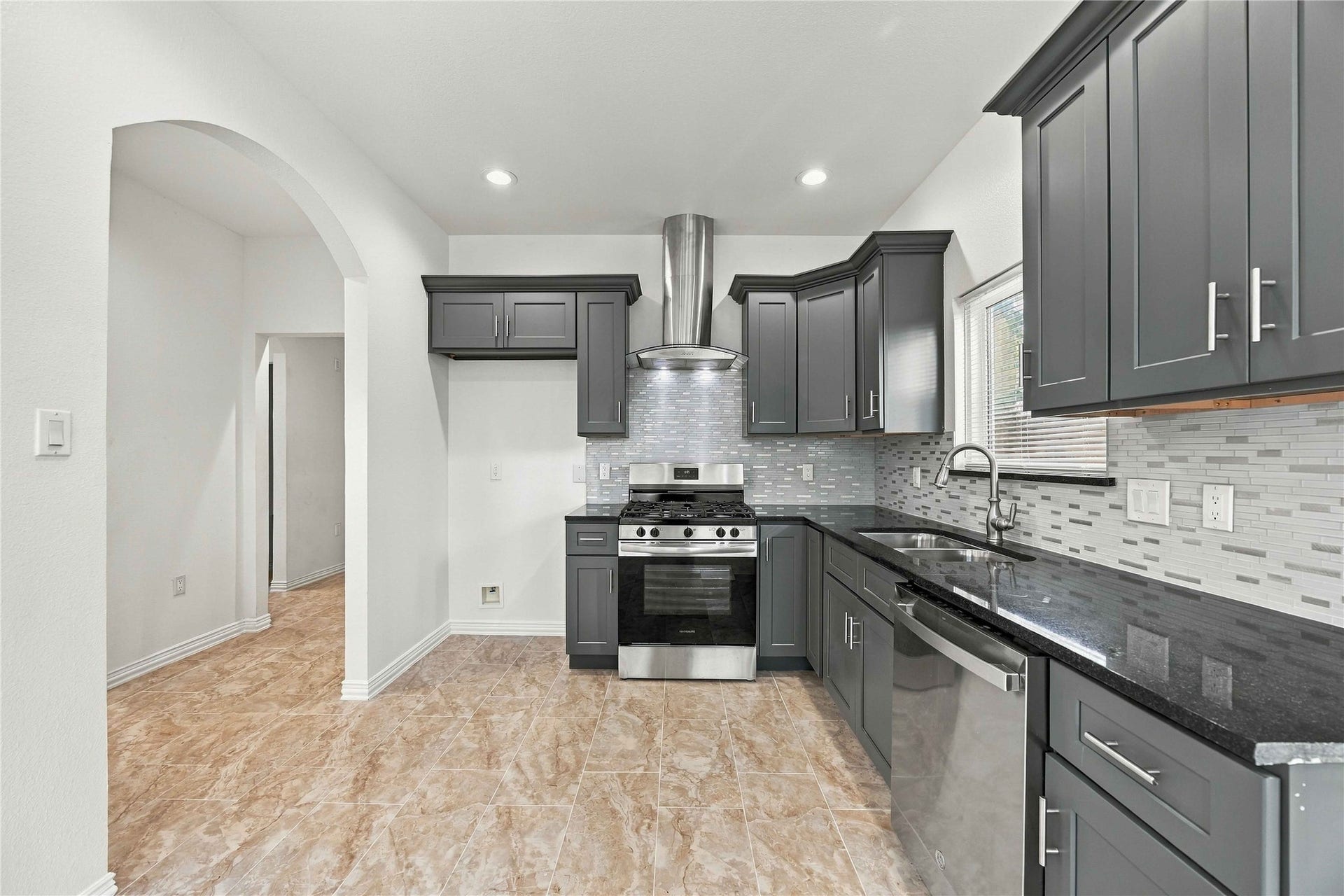 8147 Chateau Street, Houston, TX 77028 Kitchen with stainless steel appliances