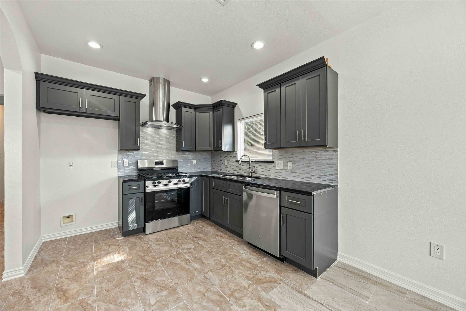 8147 Chateau Street, Houston, TX 77028 Kitchen with stainless steel appliances