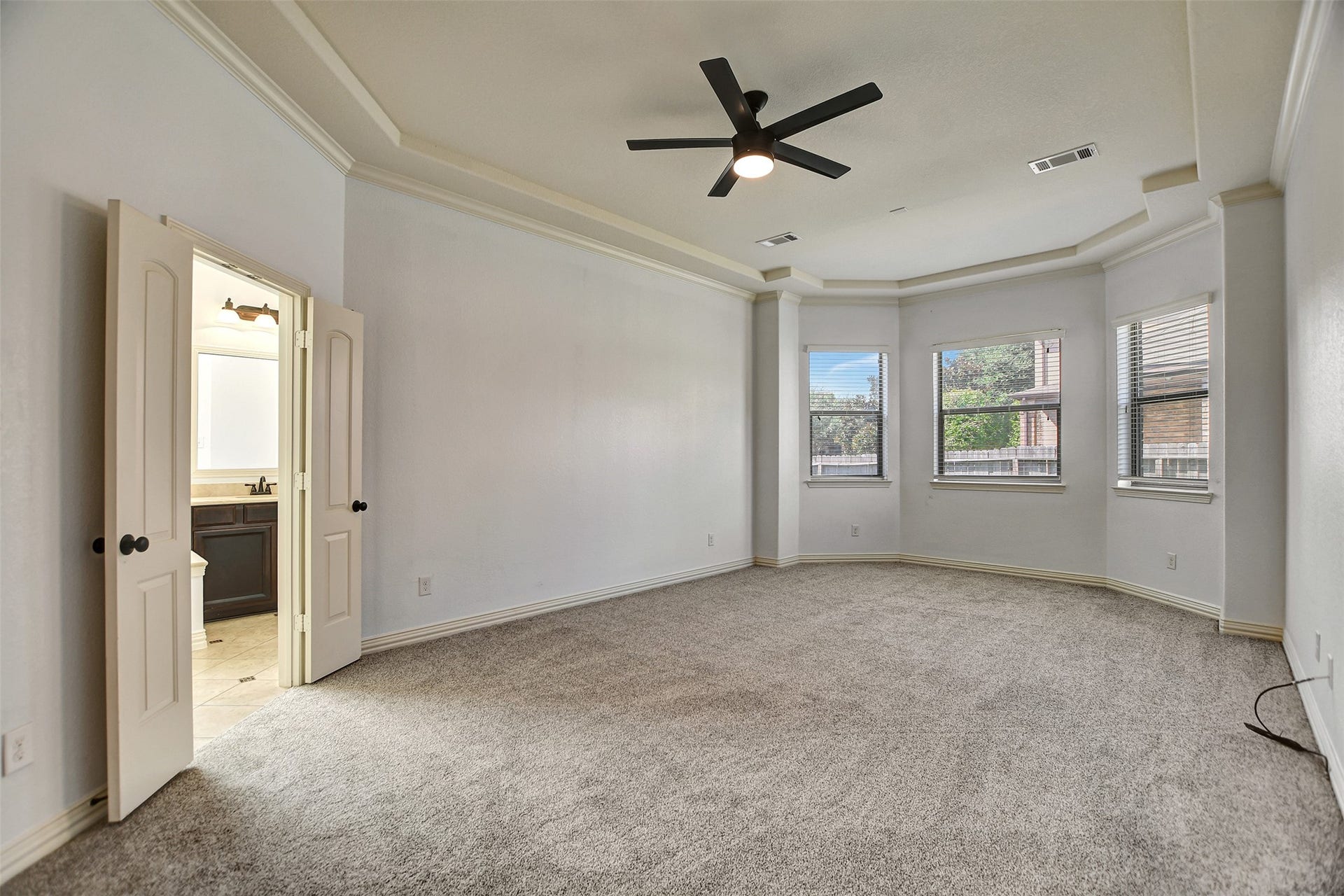 Primary Bedroom with Bay windows.