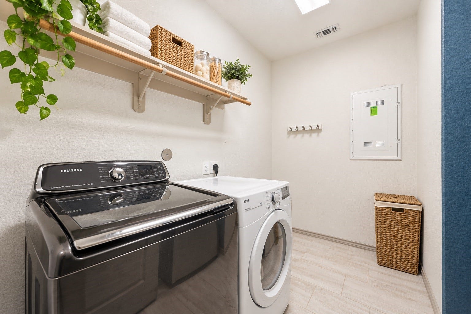 9726 Birdsnest Court, Spring, TX 77379 Virtually staged Towels, baskets, plants, and a hamper were digitally added.