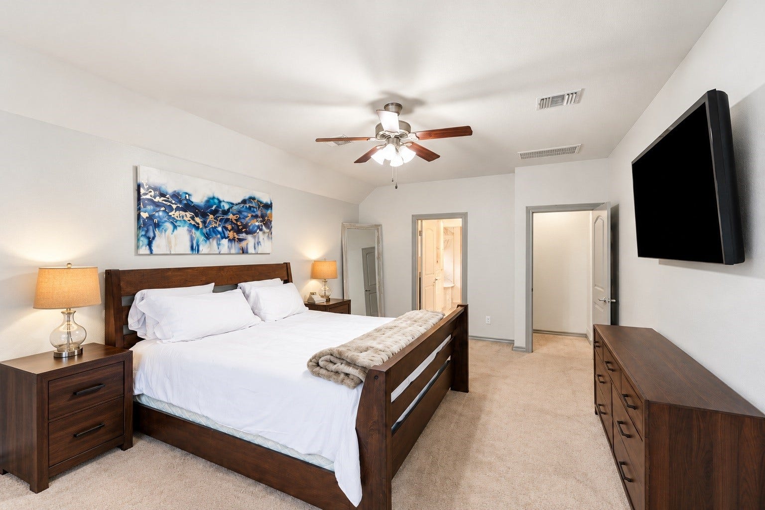 9726 Birdsnest Court, Spring, TX 77379 Virtually staged Furniture and bedside lighting were altered or added.