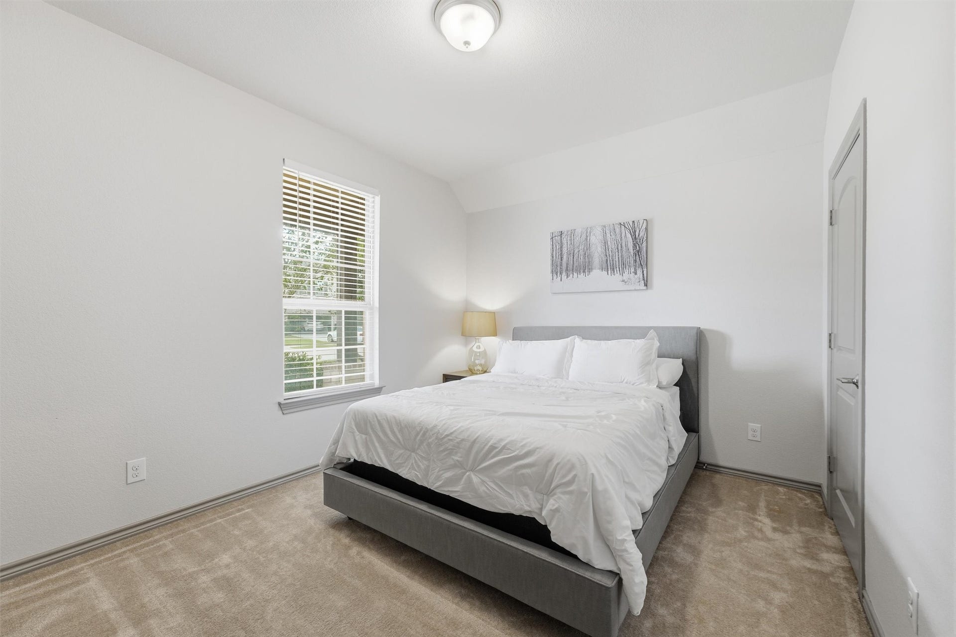 9726 Birdsnest Court, Spring, TX 77379 Comfortable secondary bedroom featuring plush