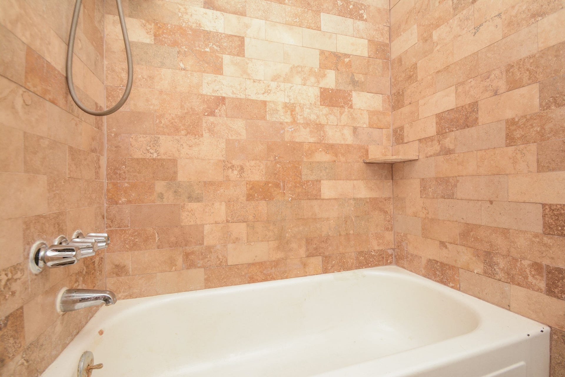 Designer tile bathtub