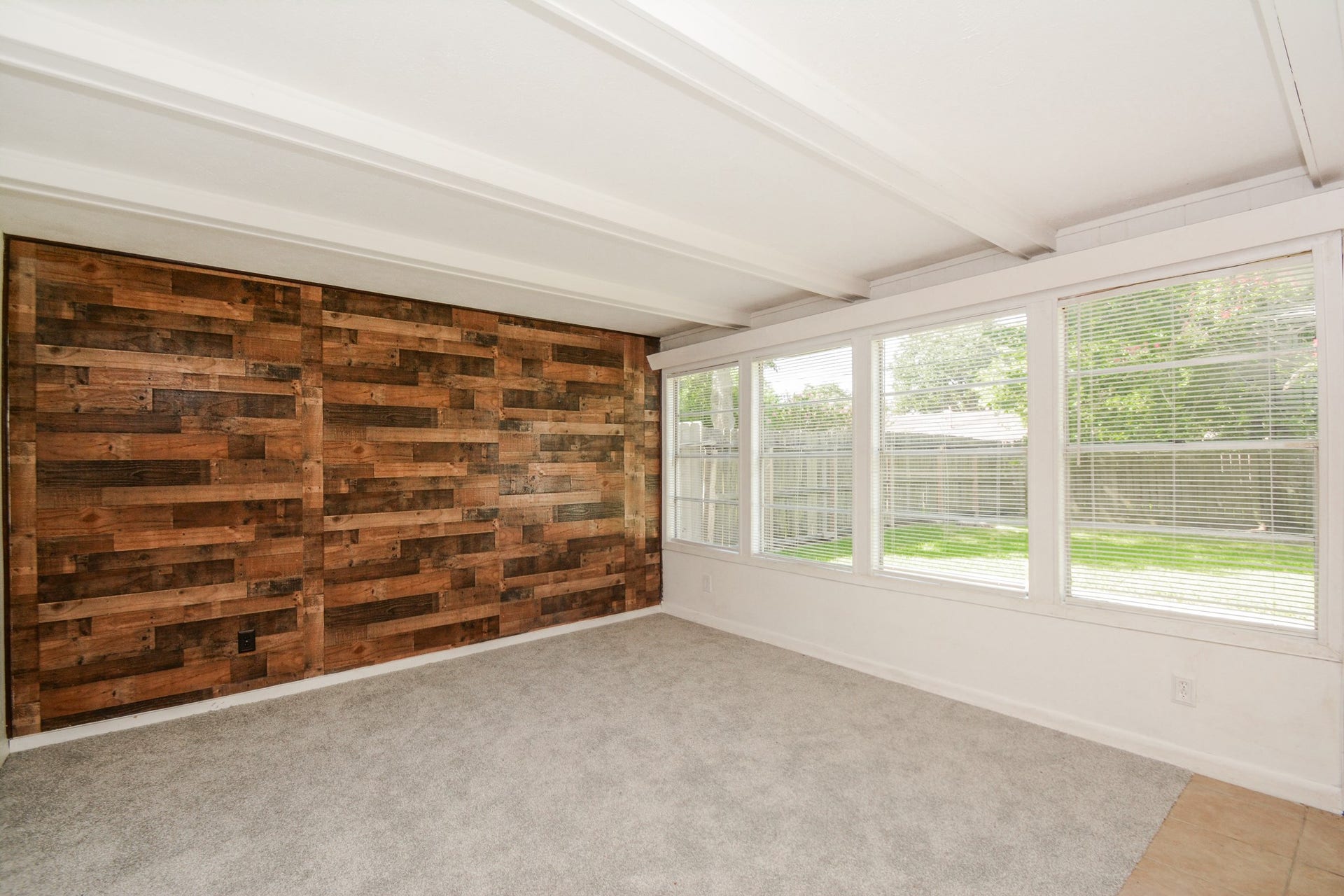 Accented feature wall off of the living area which opens to kitchen