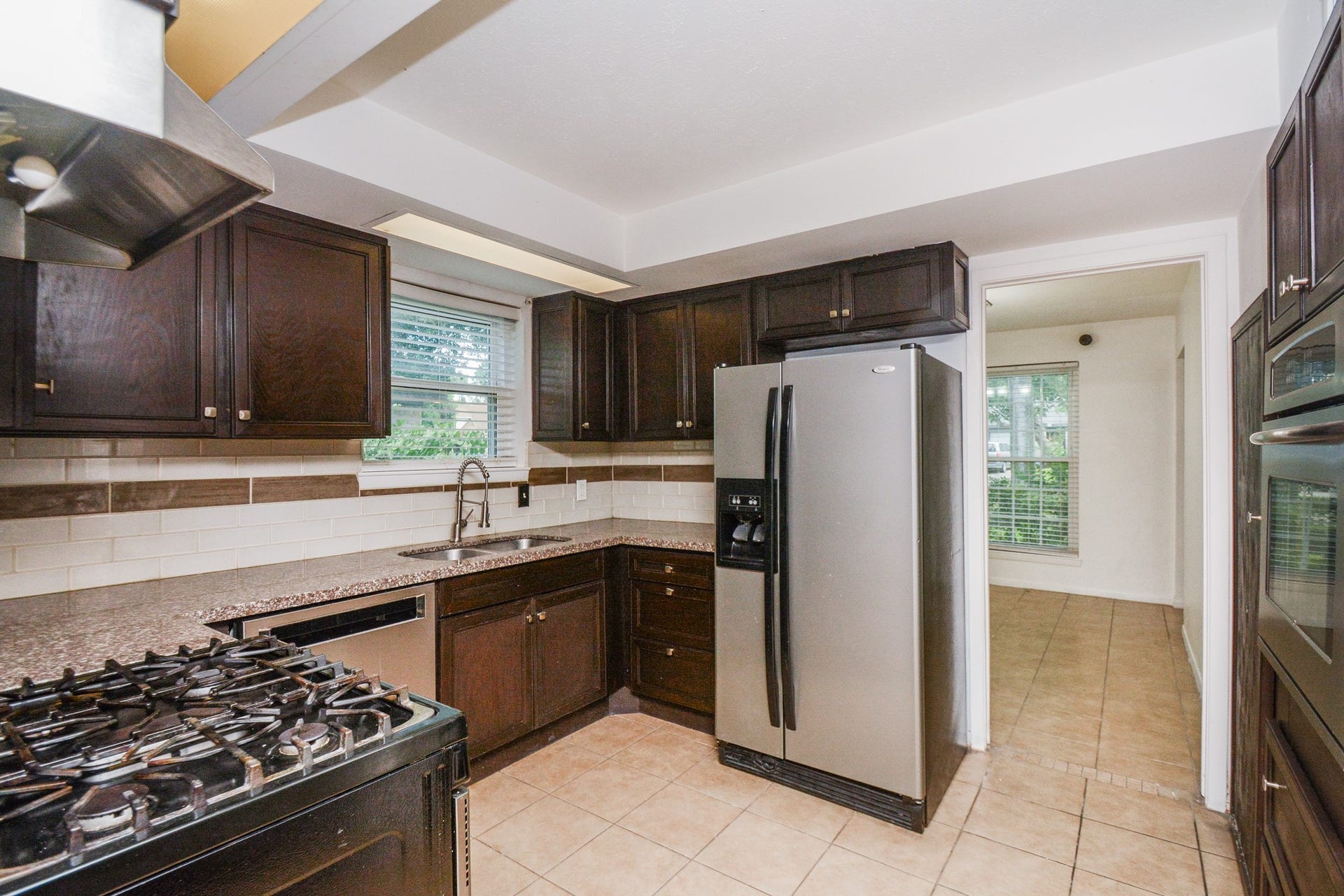 Granite kitchen countertops + Stainless Steel applicances