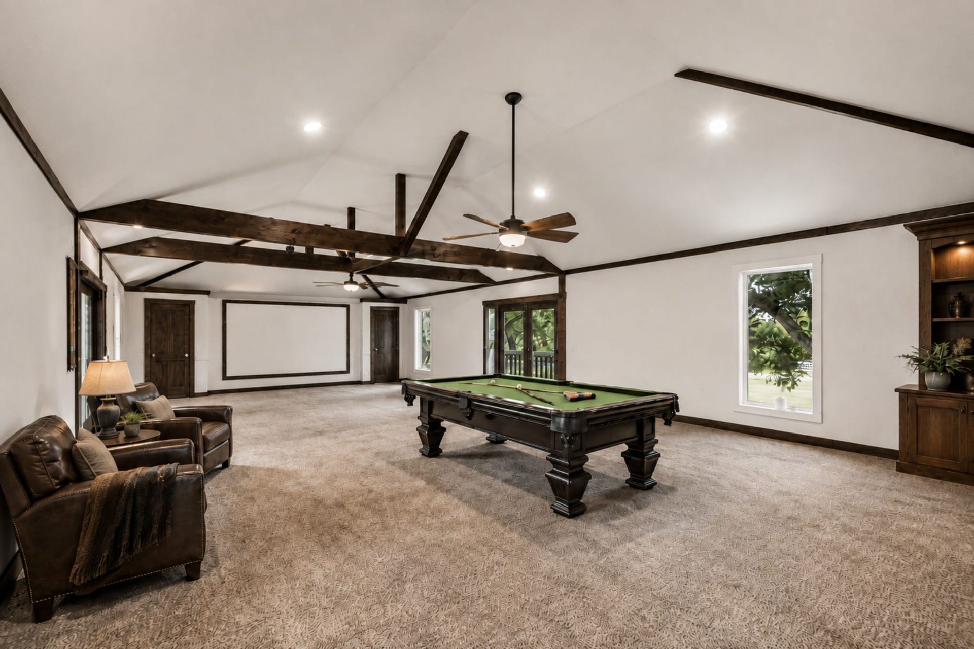 2020 PECAN LAKE DRIVE, Richmond, TX 77406 EXPANSIVE GAME ROOM SHOWCASES EXPOSED WOOD BEAMS, A VAULTED CEILING, RECESSED LIGHTING, MULTIPLE WINDOWS, AND GENEROUS OPEN FLOOR SPACE. ***Virtually Staged.