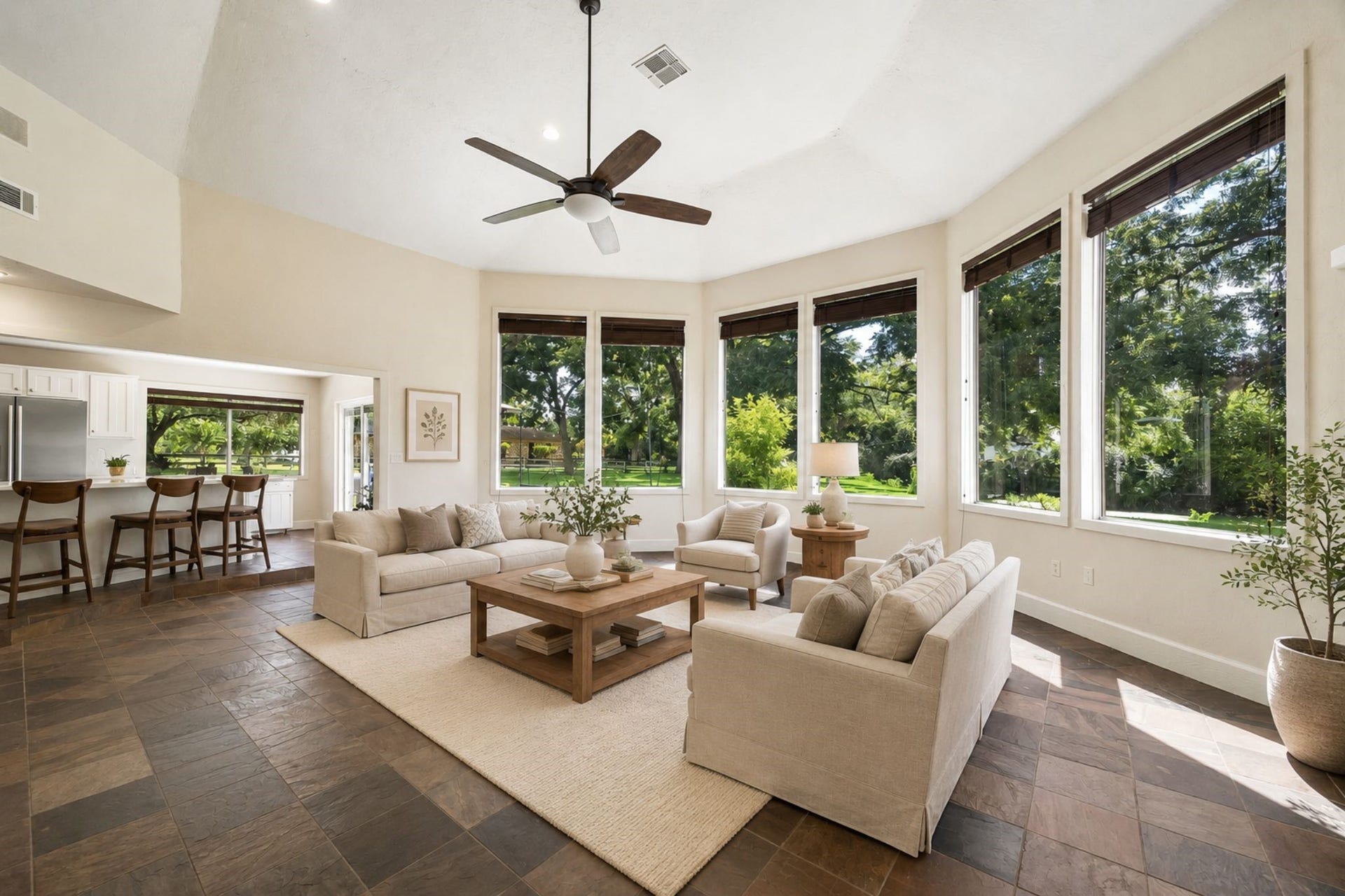 2020 PECAN LAKE DRIVE, Richmond, TX 77406 MULTIPLE OVERSIZED WINDOWS, HIGH CEILING, AND TILE FLOORING CREATE A BRIGHT, OPEN LIVING SPACE WITH VIEWS OF THE GROUNDS. ***Virtually Staged.