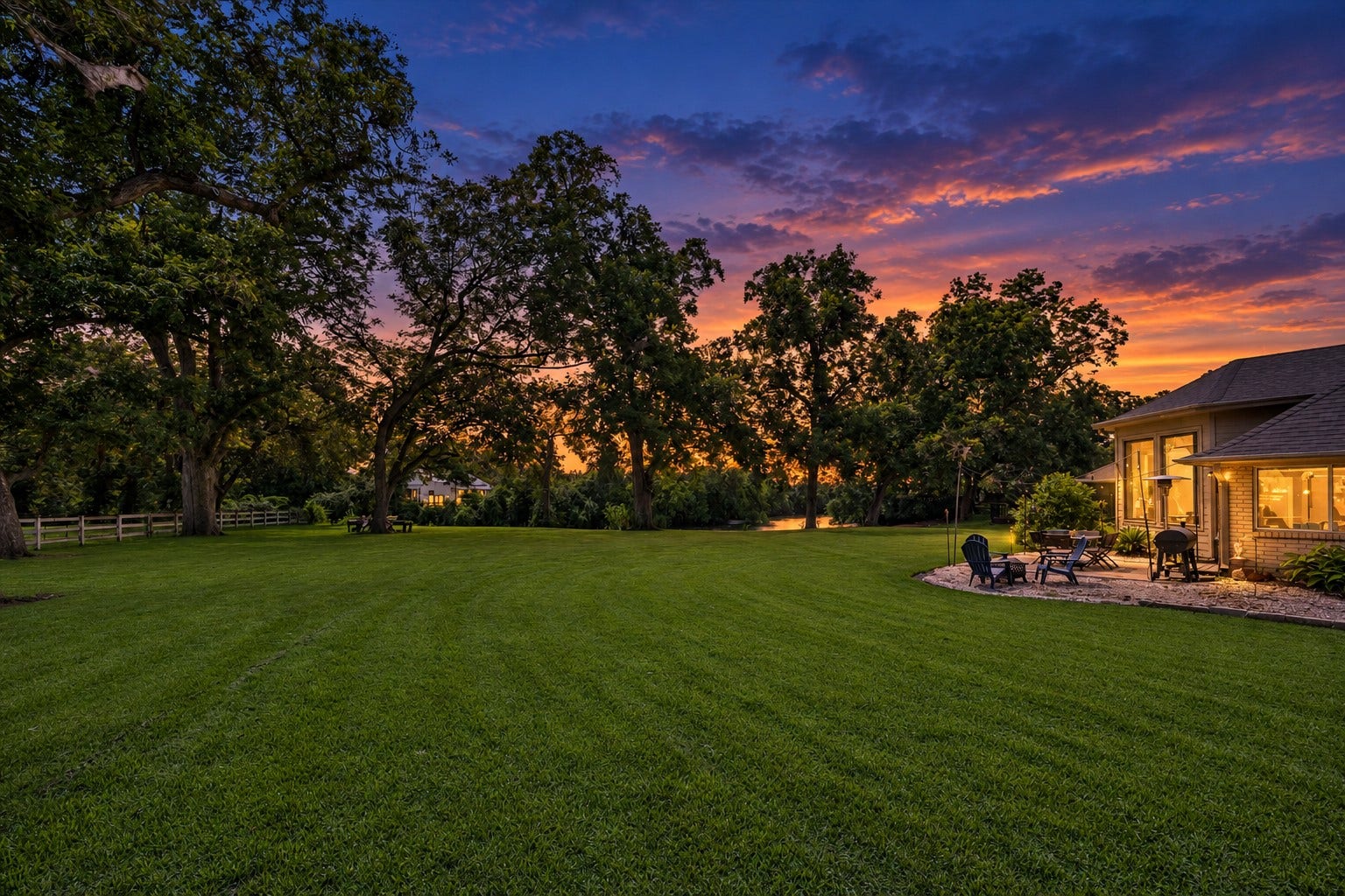 2020 PECAN LAKE DRIVE, Richmond, TX 77406 LARGE BACKYARD WITH DIRECT CREEK ACCESS - PROVIDES WIDE OPEN LAWN SPACE, MATURE SHADE TREES, AND A PATIO AREA ADJACENT TO THE HOME.