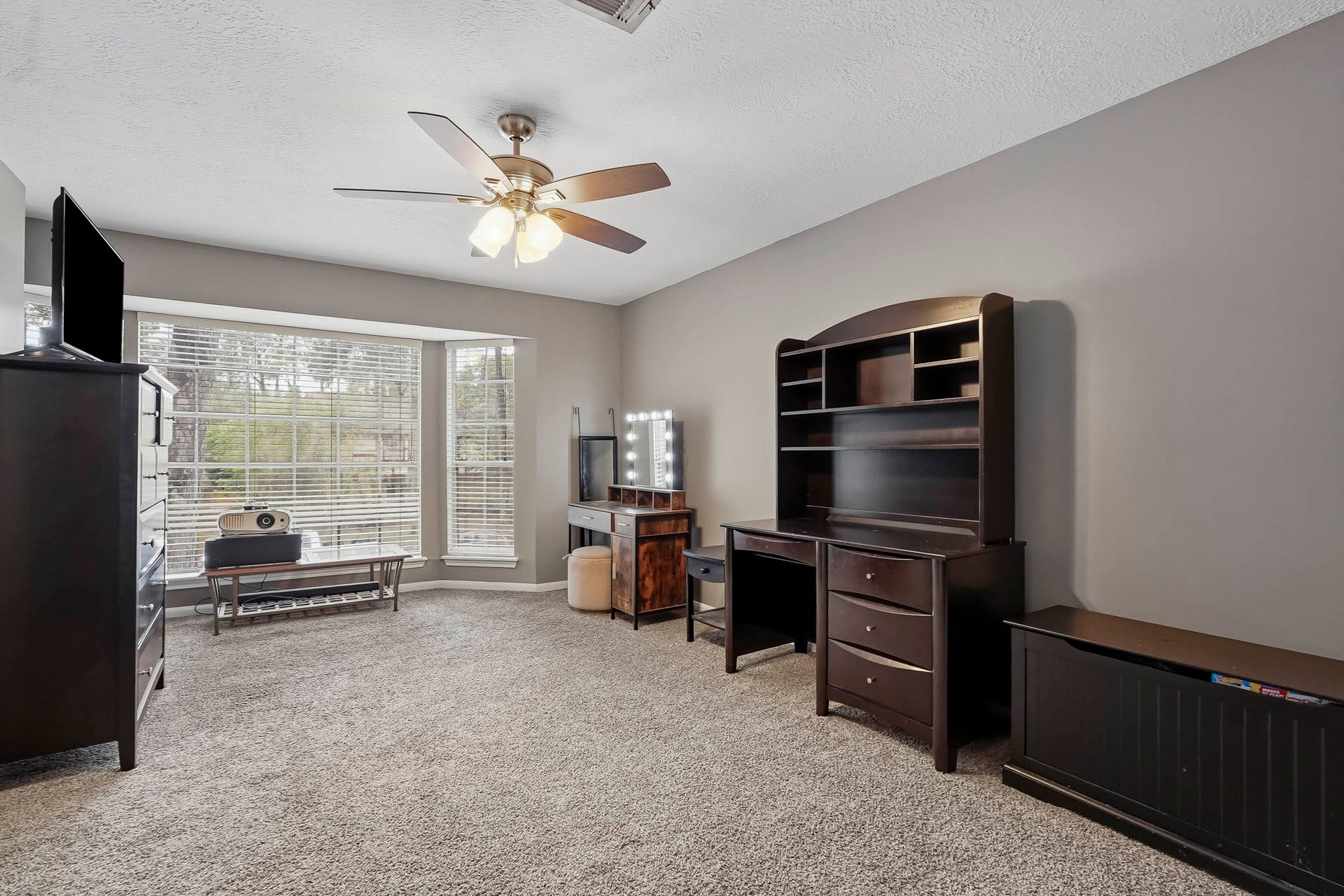 3610 Valley Haven Drive, Houston, TX 77339 Bright and spacious room with large windows, neutral tones, and ample space.
