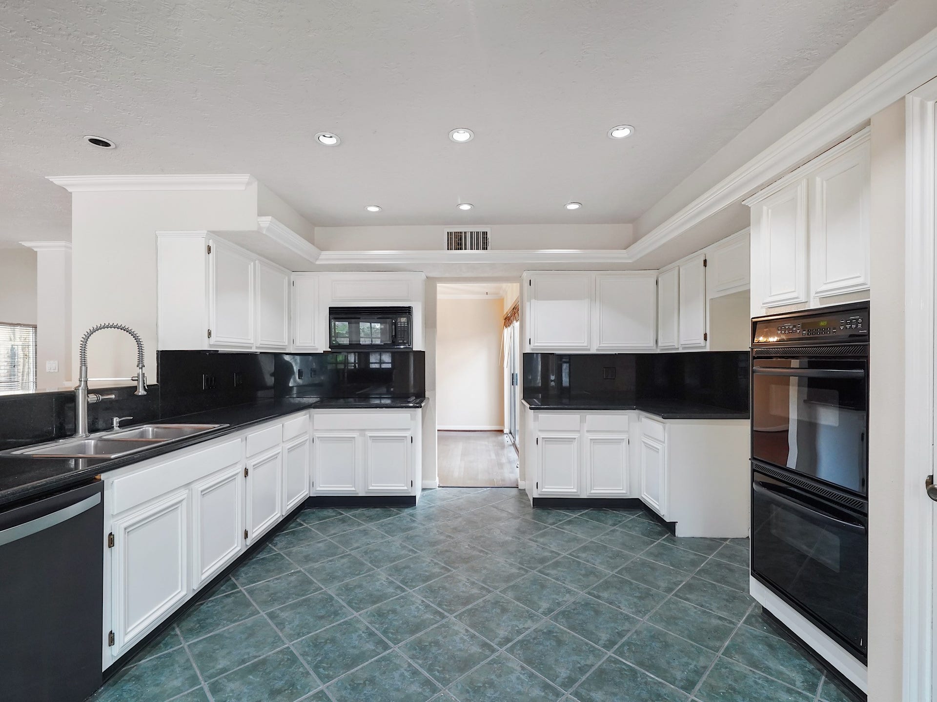 Kitchen comes along with a double oven and upgraded faucet.