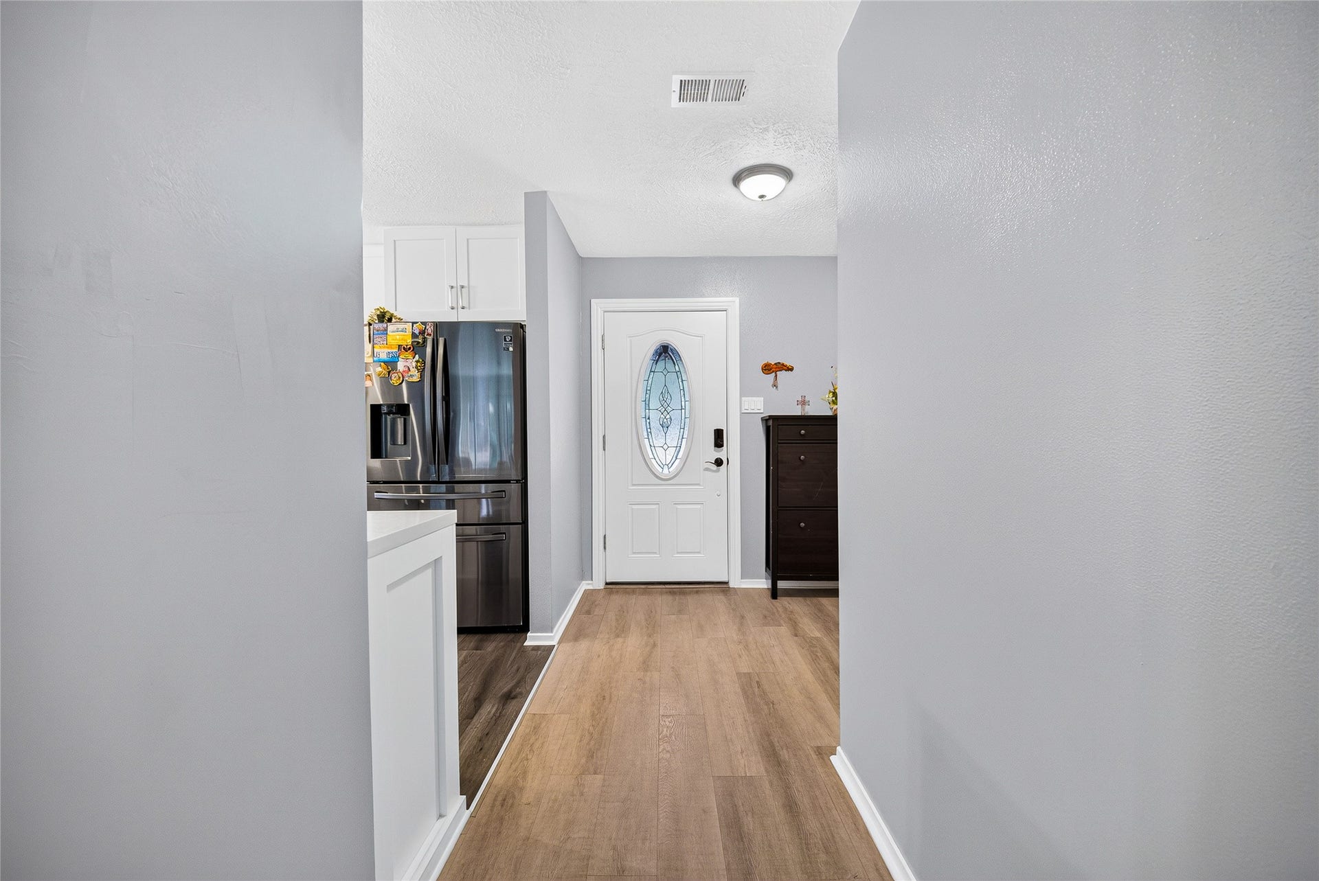 1610 N Red Cedar Circle, The Woodlands, TX 77380 Hallway back to front door