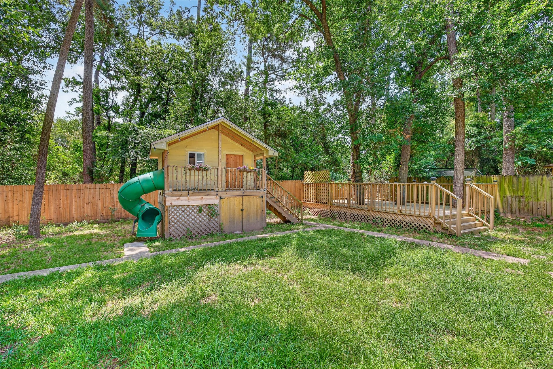 1610 N Red Cedar Circle, The Woodlands, TX 77380 Playhouse with storage underneath