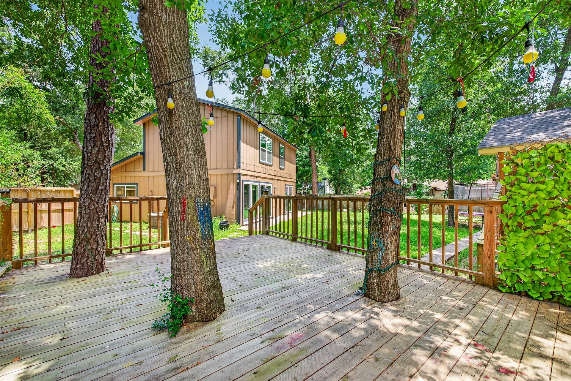 1610 N Red Cedar Circle, The Woodlands, TX 77380 Large patio/deck - great for entertaining or just a quiet spot for coffee.