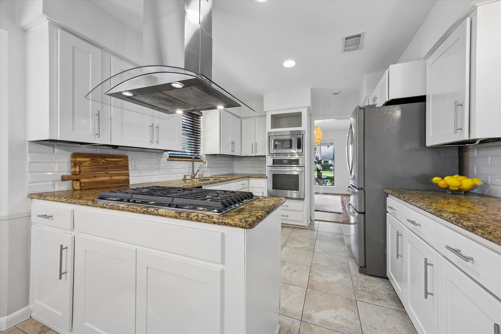 10831 Olympia Drive, Houston, TX 77042 Another perspective of the kitchen showing the abundant storage and prep space.
