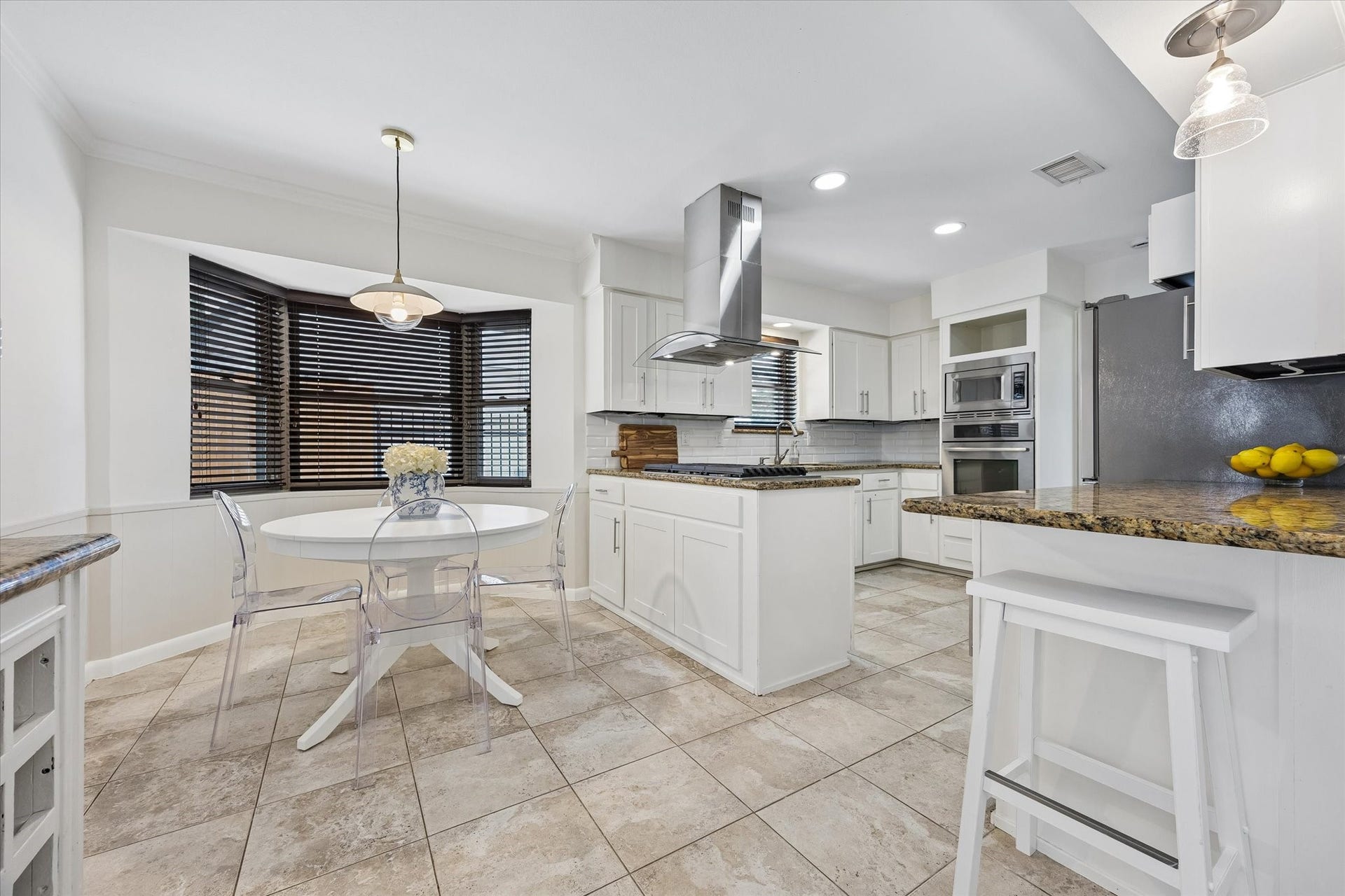 10831 Olympia Drive, Houston, TX 77042 With a smart layout and extensive custom storage, this kitchen is built for organization and easy every day living.