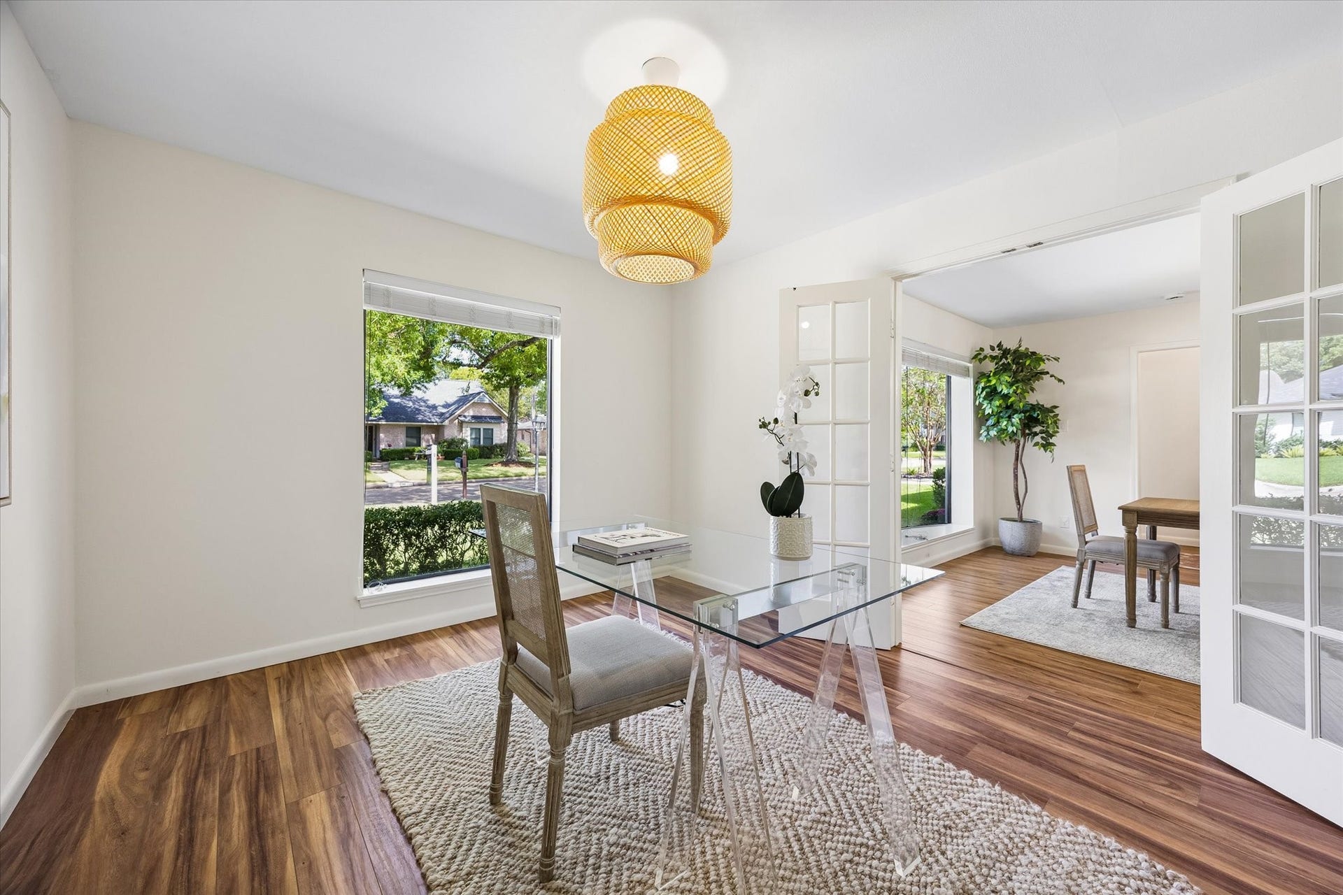 10831 Olympia Drive, Houston, TX 77042 Just off the formal dining room, the office is accessed through elegant French doors, offering a quiet and private space.
