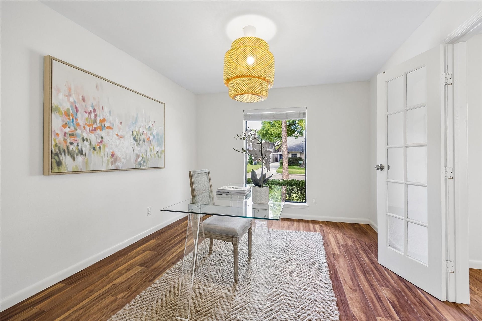 10831 Olympia Drive, Houston, TX 77042 An alternative view of the office, highlighted by French doors and a charming chandelier.
