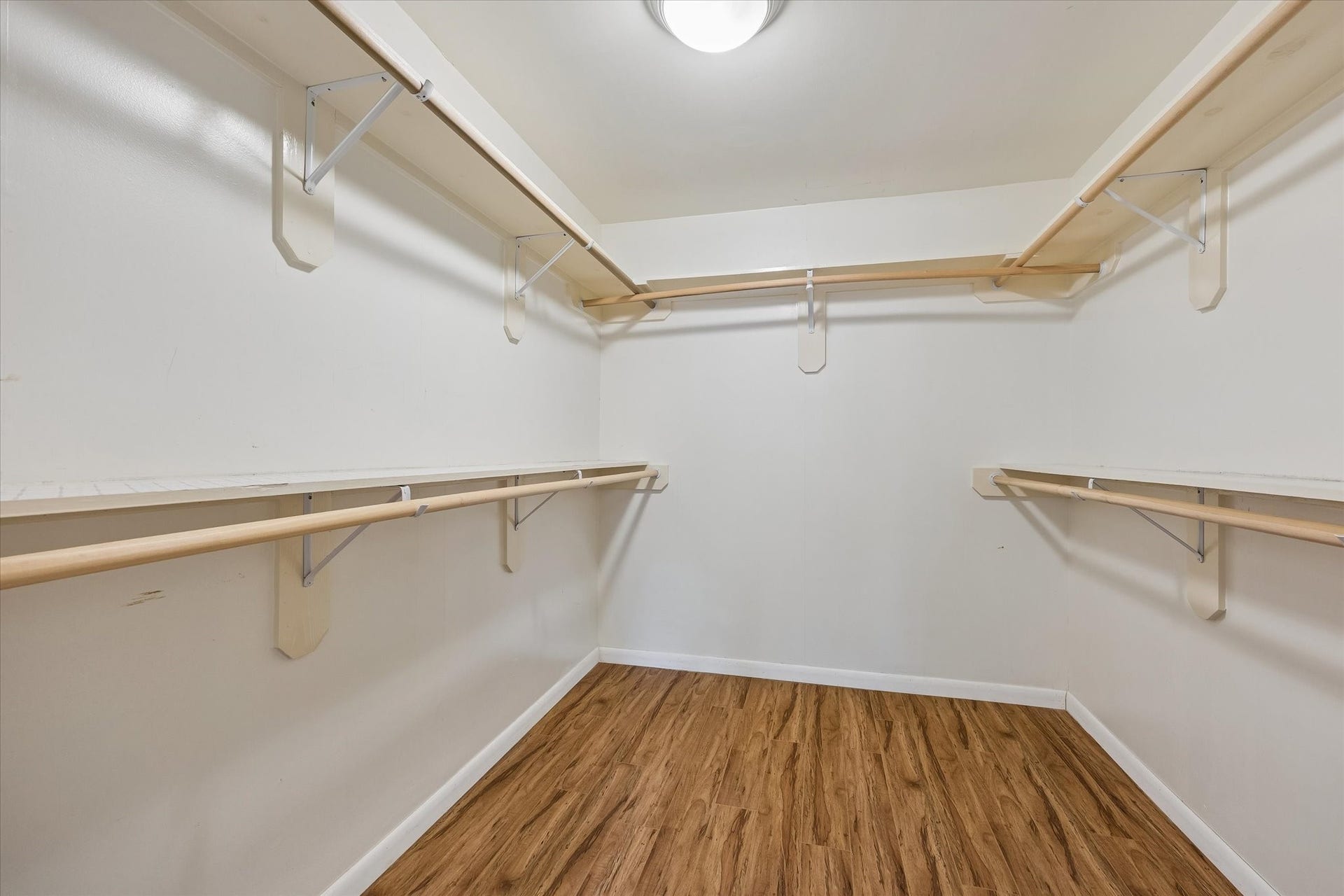10831 Olympia Drive, Houston, TX 77042 Primary walk-in closet features an impressive amount of hanging space.