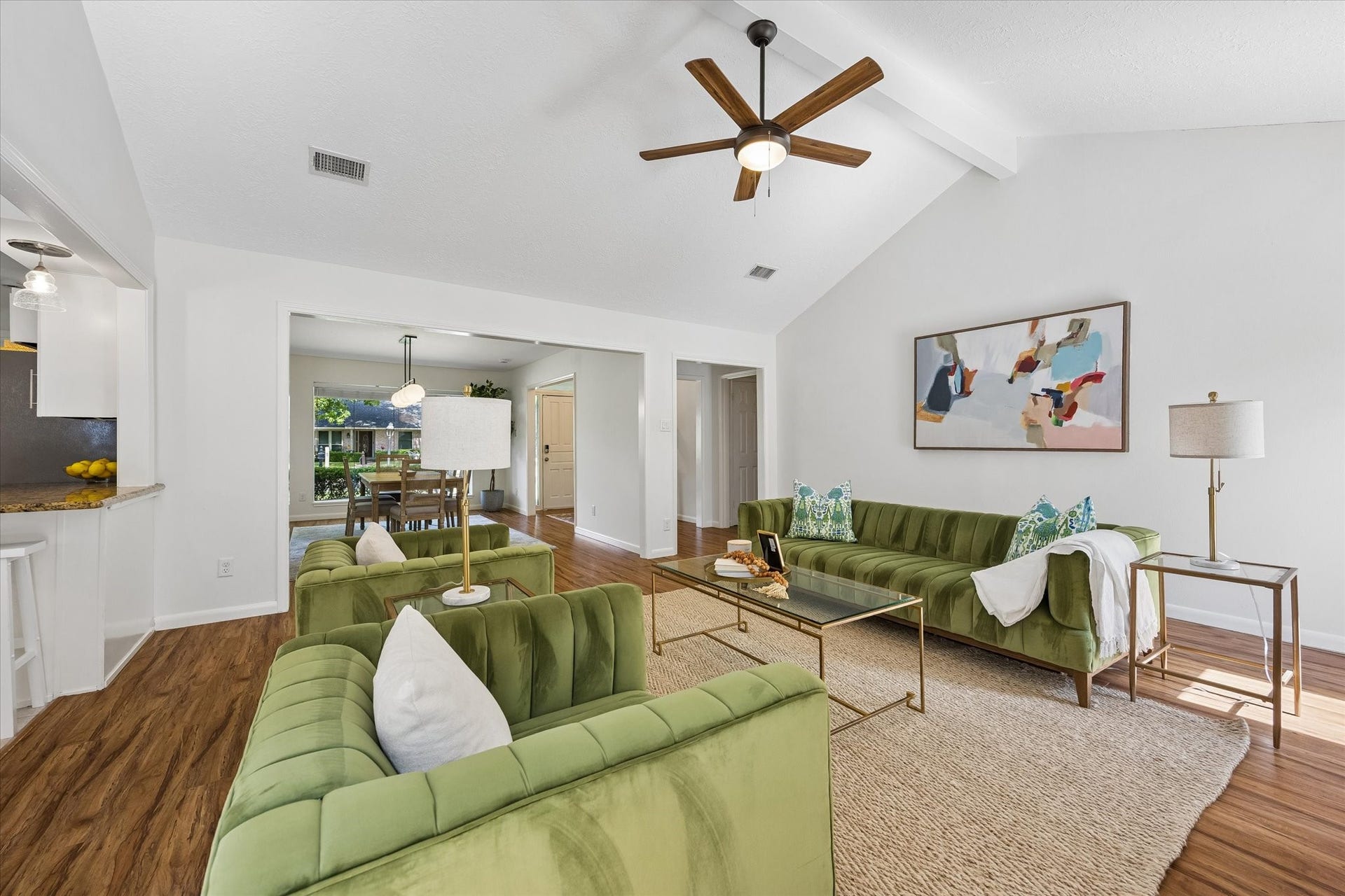 10831 Olympia Drive, Houston, TX 77042 The expansive living area flows seamlessly toward the formal dining room and entry.