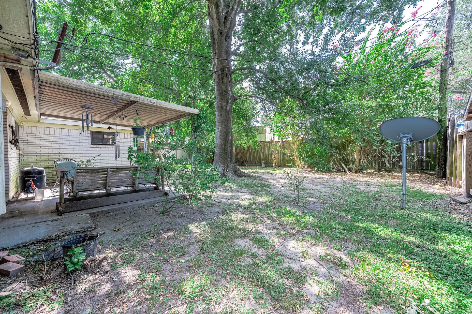 2308 Florence Avenue, Pasadena, TX 77502 Spacious backyard with mature trees and plenty of room to enjoy.