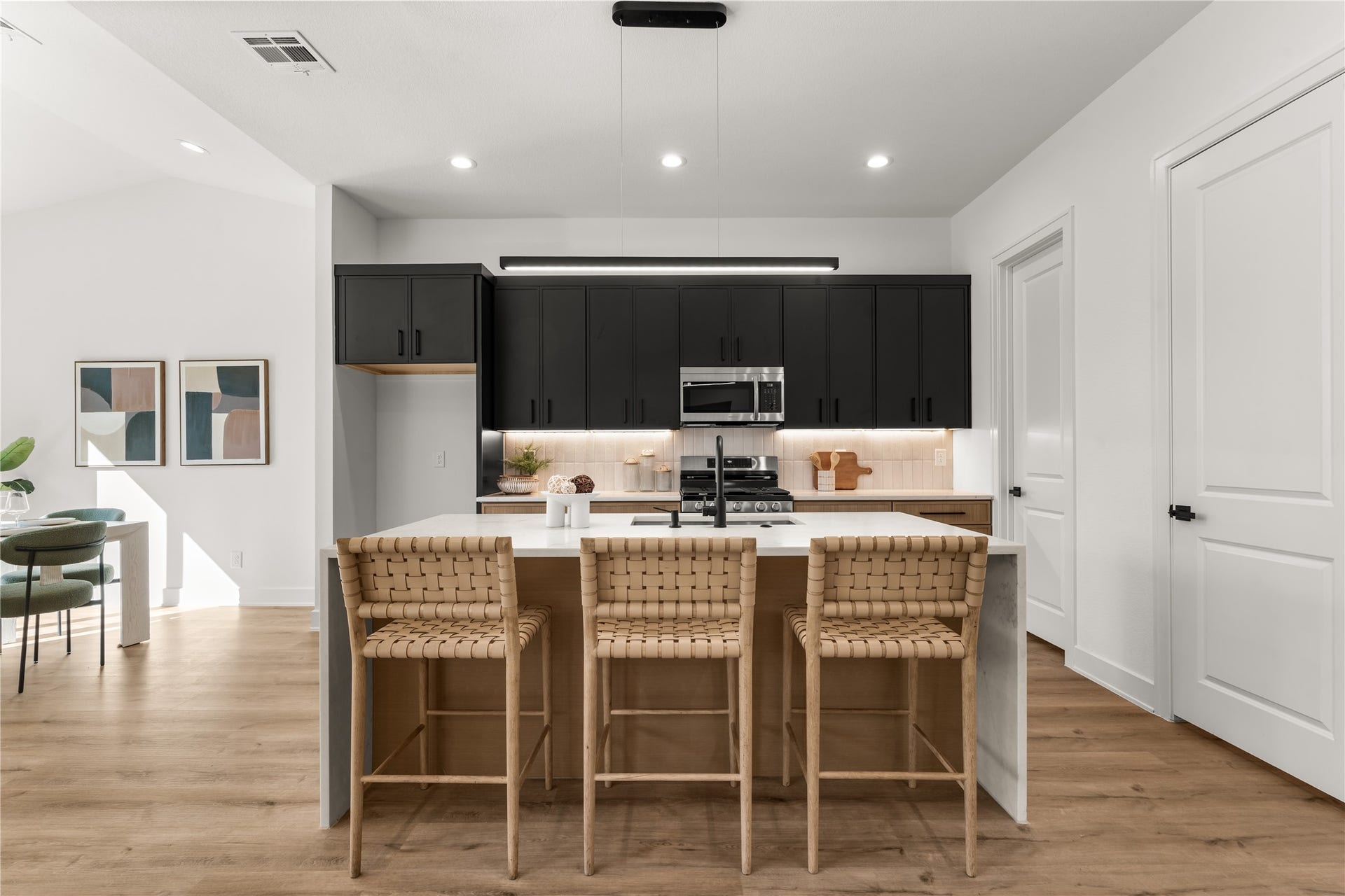 6714 Tierwester Street, Houston, TX 77021 Positioned between the living and dining areas, the kitchen encourages effortless interaction while keeping everyday essentials within easy reach.