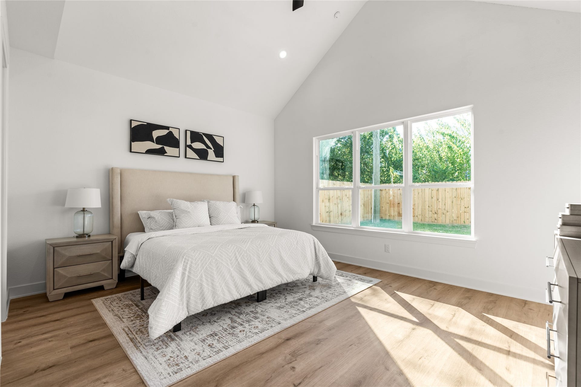 6714 Tierwester Street, Houston, TX 77021 A trio of oversized windows frames views of the private backyard, lending the space an airy quality while maintaining a sense of intimacy.