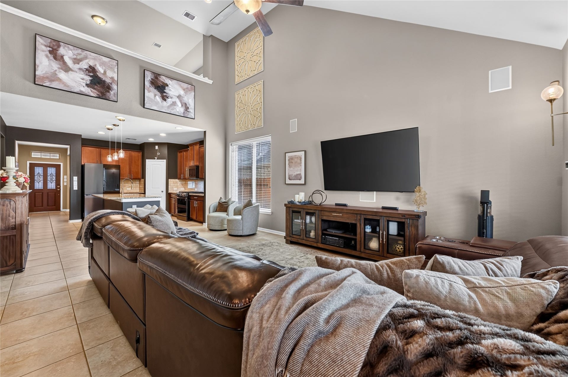 5307 Royal Press Drive, Katy, TX 77493 Family room has very tall ceilings that can be overlooked by gameroom upstairs.