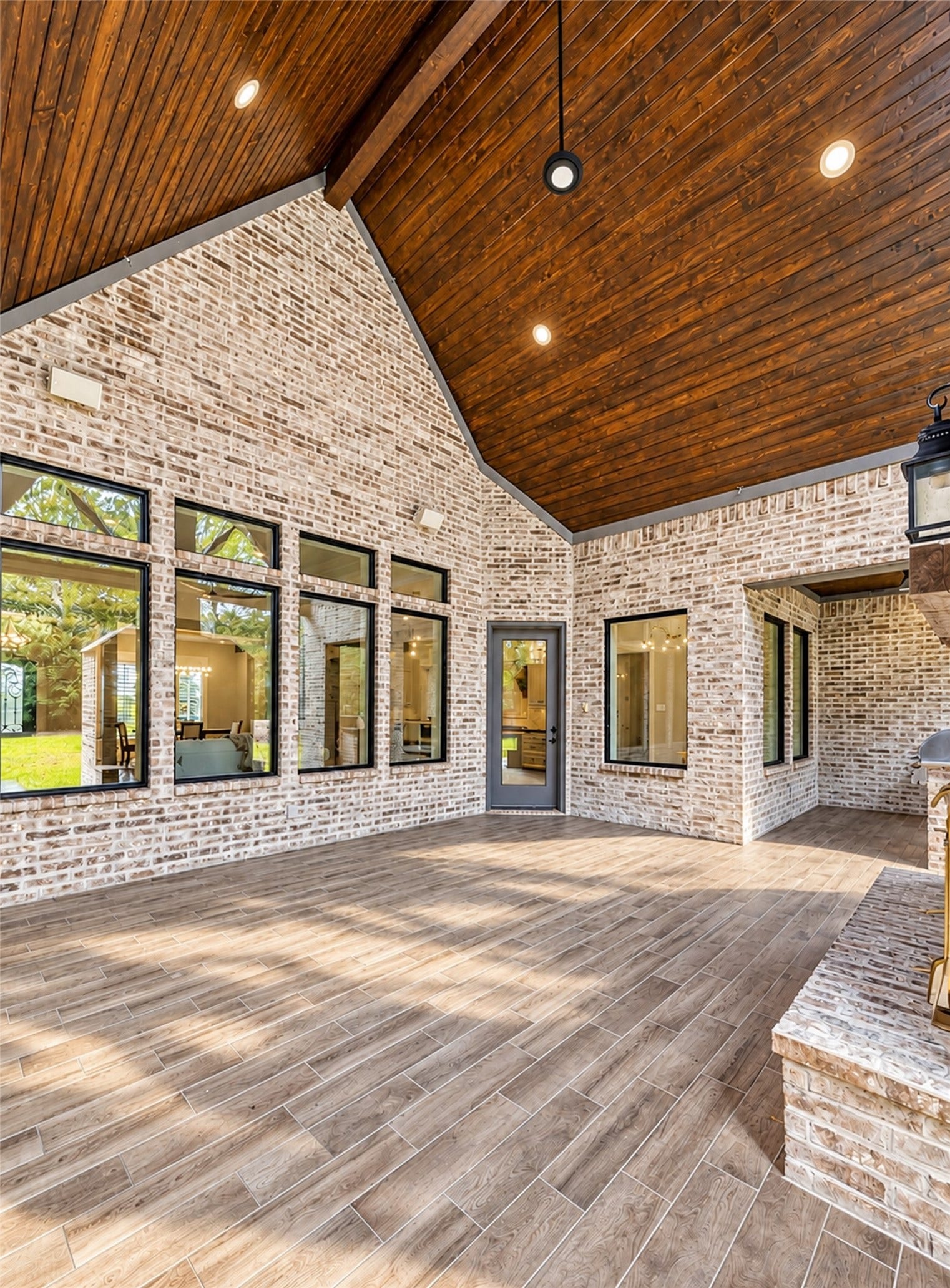 3232 Walnut Creek Court, Bryan, TX 77807 Covered patio with wood slat vaulted ceiling