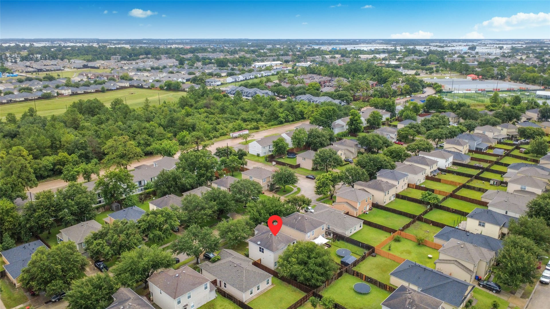 Charming suburban neighborhood with well-maintained homes, lush green surroundings, and a peaceful ambiance.