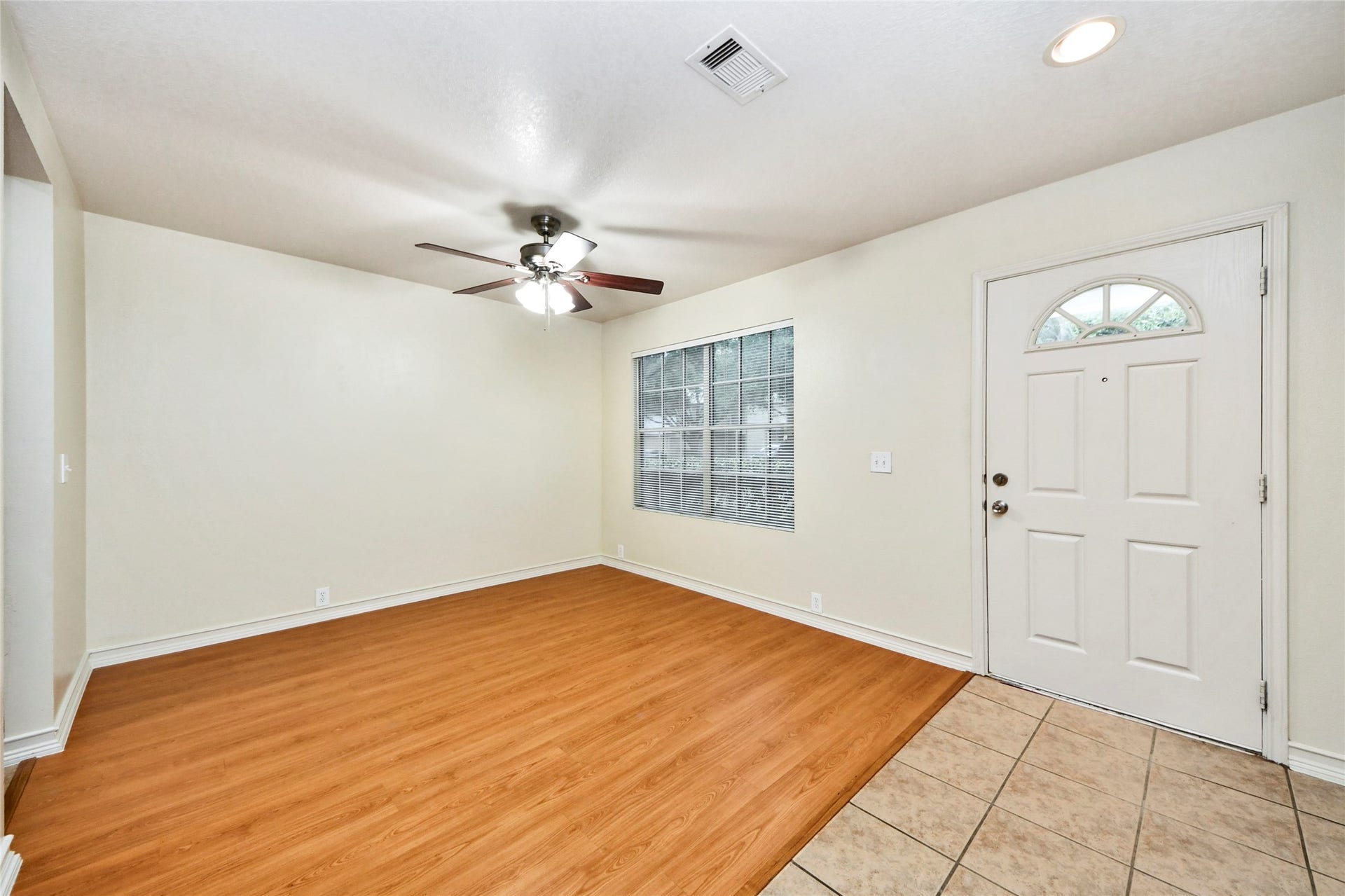 Step into this versatile den or flex room right by the entrance, offering a welcoming space perfect for relaxation or productivity.