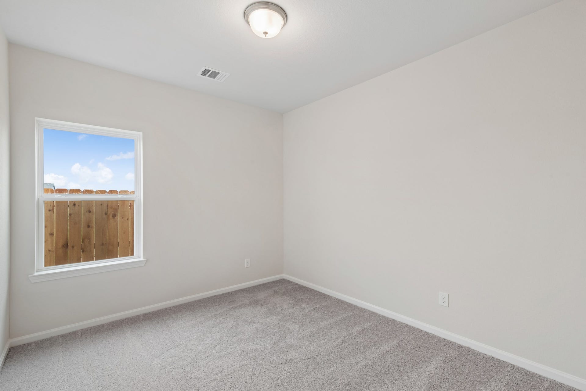 2518 Outpost Canyon Drive, Iowa Colony, TX 77583 The Oakshire II- Bedroom 2. Sample image for illustration; upgrades, options, and colors may vary.