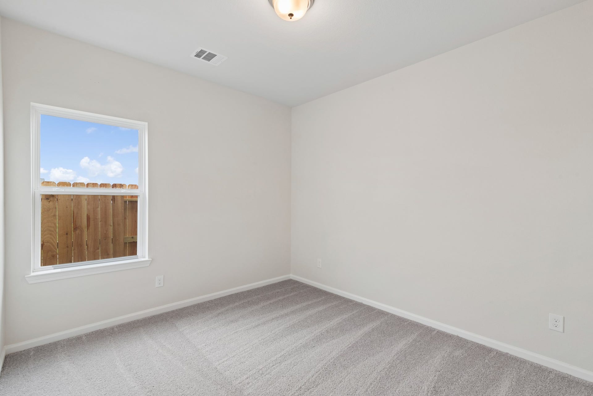 2518 Outpost Canyon Drive, Iowa Colony, TX 77583 The Oakshire II- Bedroom 3. Sample image for illustration; upgrades, options, and colors may vary.