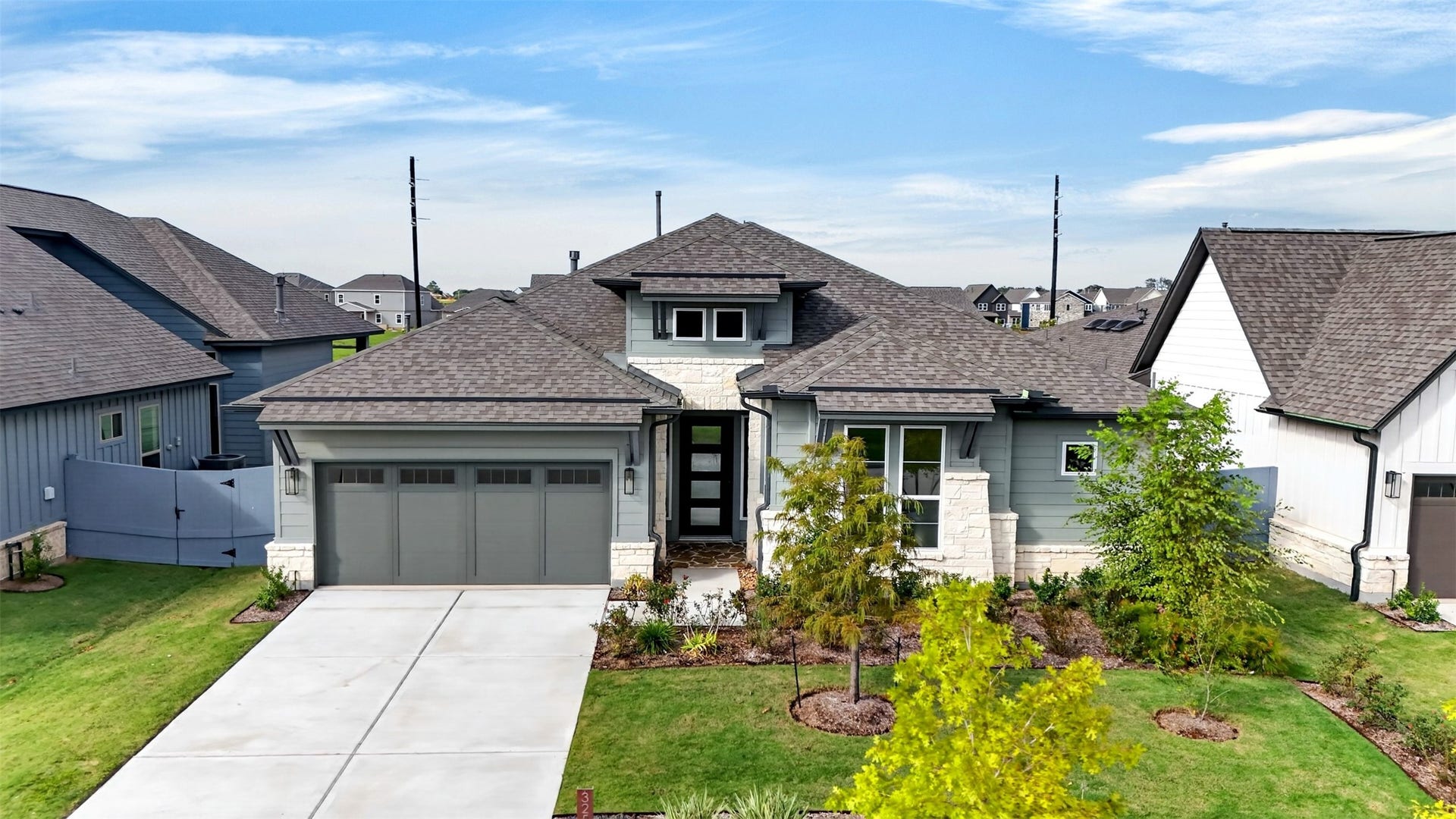 32506 Ebony Jewelwing Court, Fulshear, TX 77441 Aerial Front Exterior
Stunning aerial view highlighting the home's sophisticated architecture, beautiful stone accents, manicured landscaping, and inviting curb appeal.