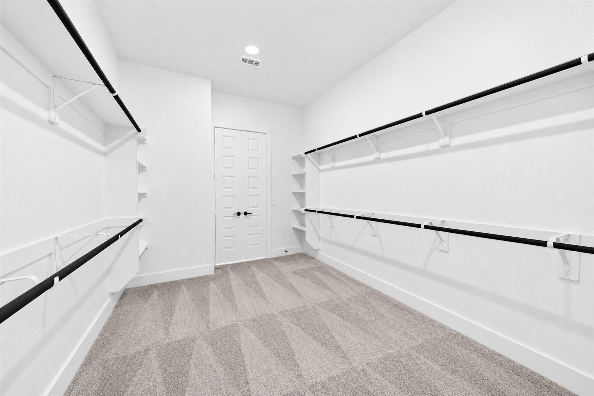 32506 Ebony Jewelwing Court, Fulshear, TX 77441 Primary Walk-In Closet (Additional View)
Another perspective of the oversized primary closet showcasing its impressive dimensions, abundant hanging space, and thoughtfully designed storage.