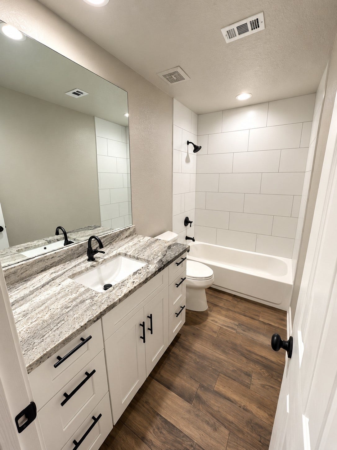 2102 Autumn Cove Drive, League City, TX 77573 Beautifully updated upstairs bathroom featuring a single-sink vanity, modern fixtures, and stylish finishes.