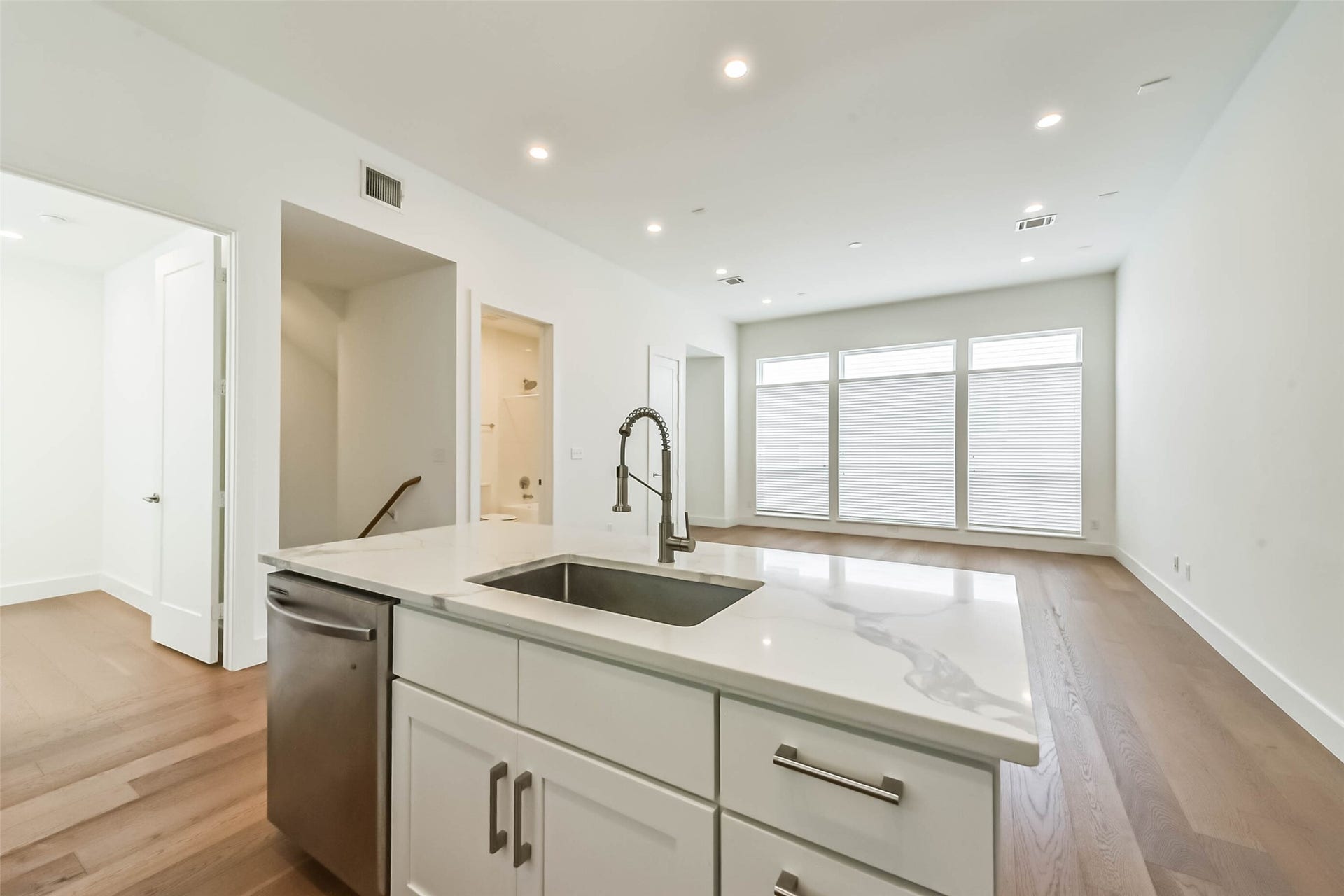 2408 Emancipation Avenue, #A, Houston, TX 77004 Living&Kitchen-Bright living room overlooking the open-concept kitchen
