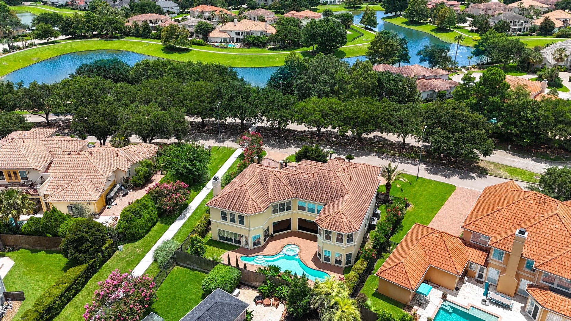 14114 Barnhart Boulevard, Houston, TX 77077 This home features a prime location situated directly in front of the lake, offering convenient, easy access to nearby walking and biking pathways.