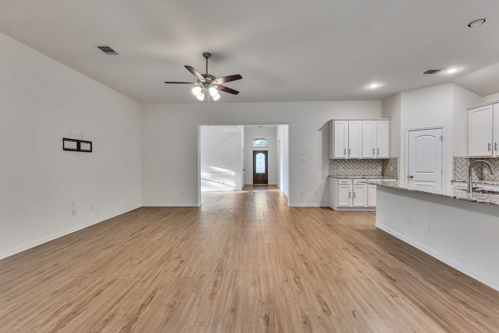 Living room with view of front entry
