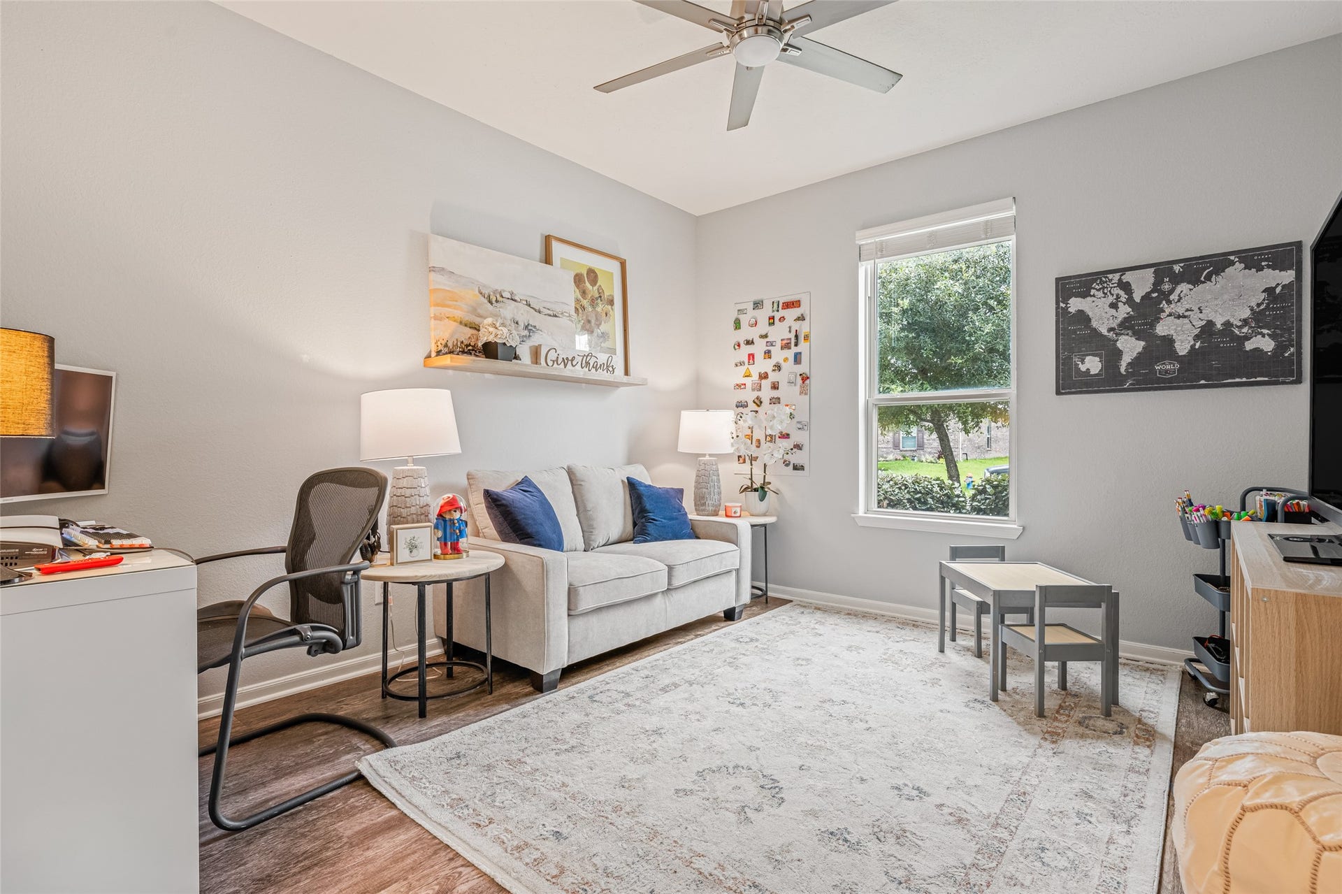 3806 Belmore Lane, Pearland, TX 77584 This flexible room gives you space to work, relax, watch movies, or create a play area, with natural light and a ceiling fan keeping the space comfortable.