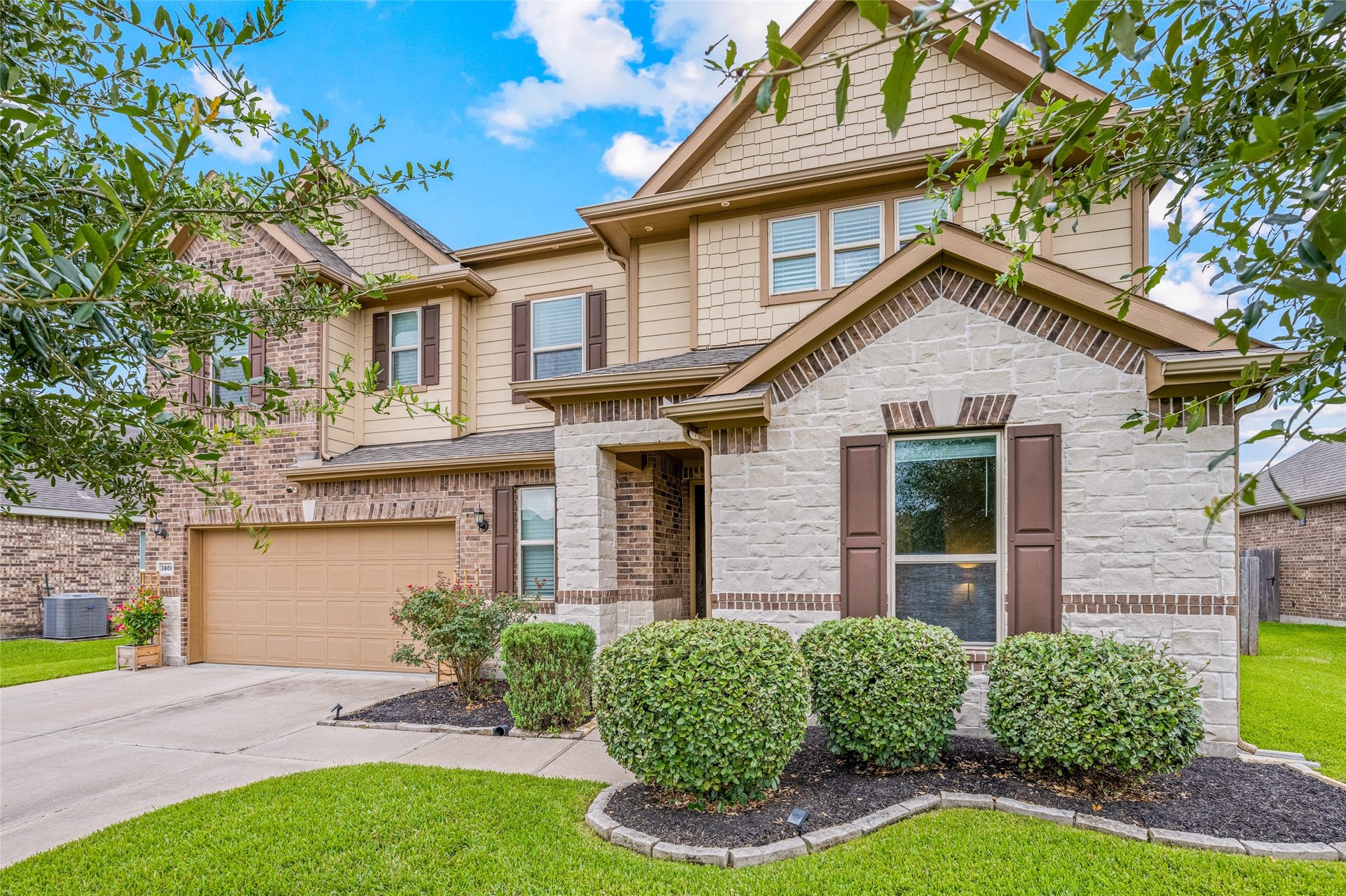 3806 Belmore Lane, Pearland, TX 77584 Pulling into the driveway, youre greeted by handsome stone and brickwork, manicured landscaping, and the inviting curb appeal of your two-story home.