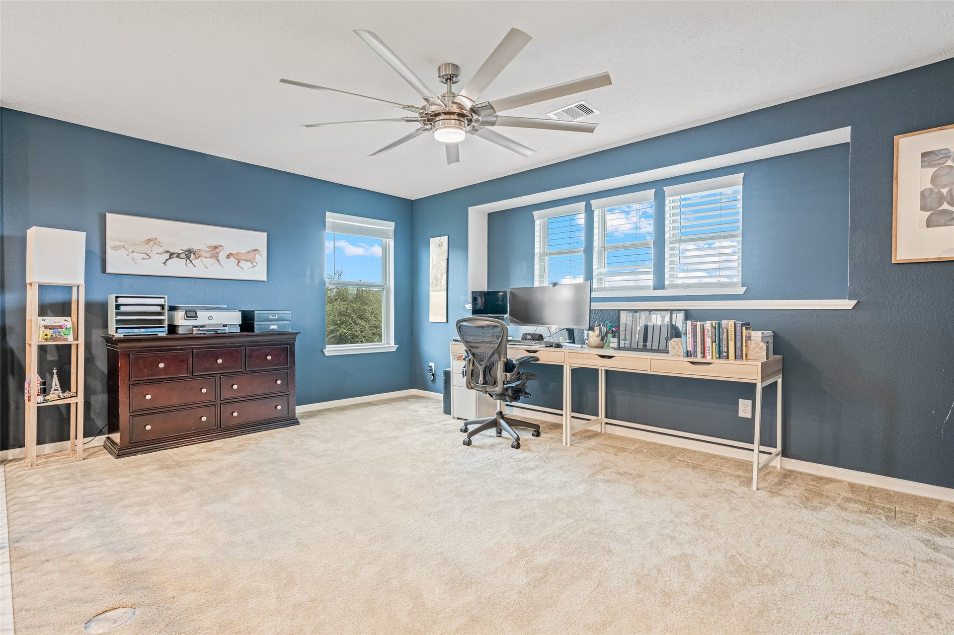 3806 Belmore Lane, Pearland, TX 77584 The flexible loft gives you room to spread out, whether you use it as a dedicated home office, creative space, or an additional lounge area.