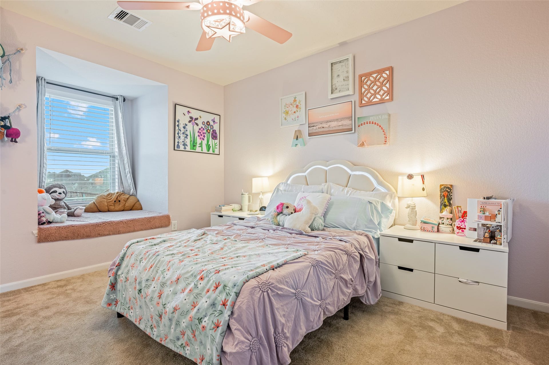 3806 Belmore Lane, Pearland, TX 77584 Enjoy a bright, comfortable bedroom with a cozy window seat that gives you the perfect spot to curl up and unwind.