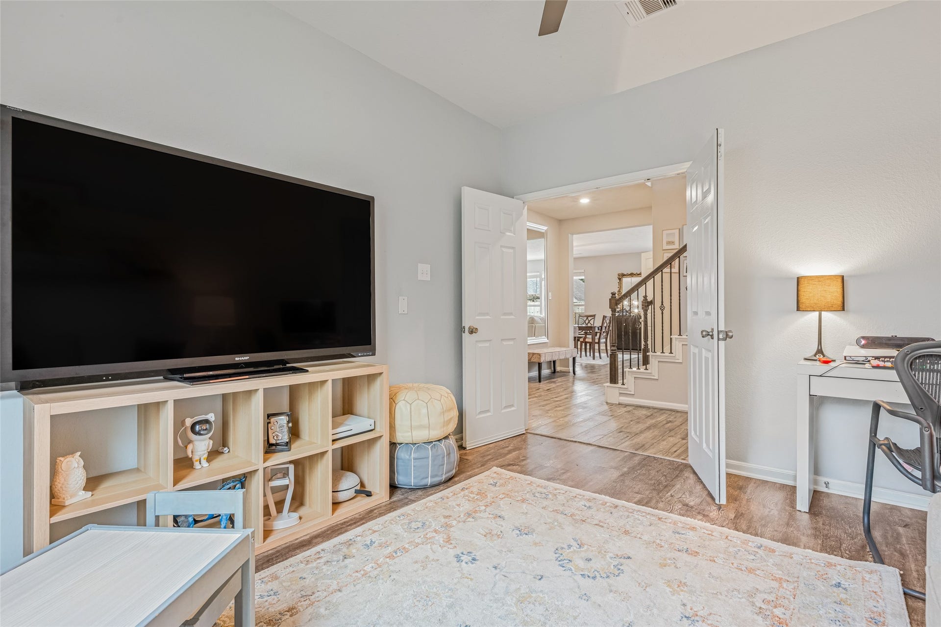 3806 Belmore Lane, Pearland, TX 77584 Double doors give this versatile room added privacy, making it easy to use as your home office, media room, playroom, or whatever best fits your daily routine.