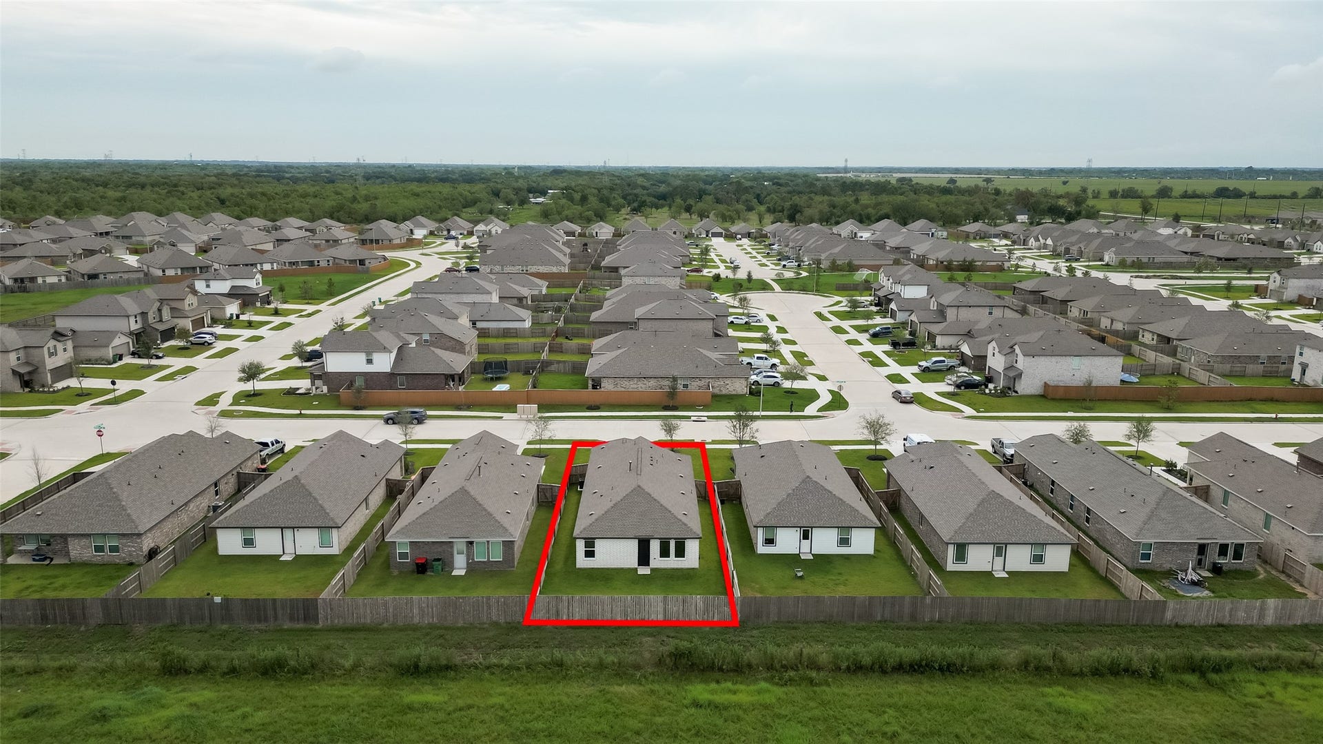 7814 Lavender Jade Drive, Rosharon, TX 77583 This aerial photograph provides a detailed outline of the property boundary lines.