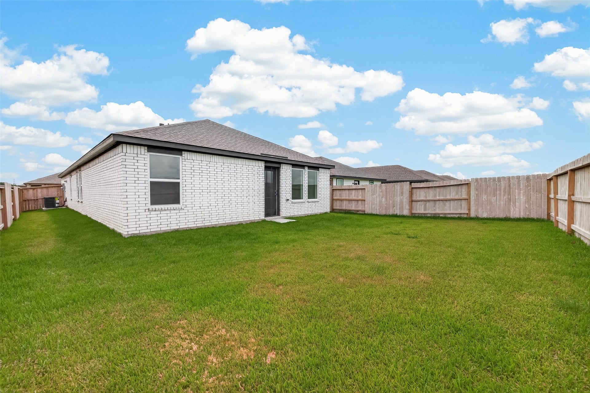7814 Lavender Jade Drive, Rosharon, TX 77583 This stunning all-brick home features an expansive, oversized backyard with the added luxury of no back neighbors, ensuring complete privacy for you and your family