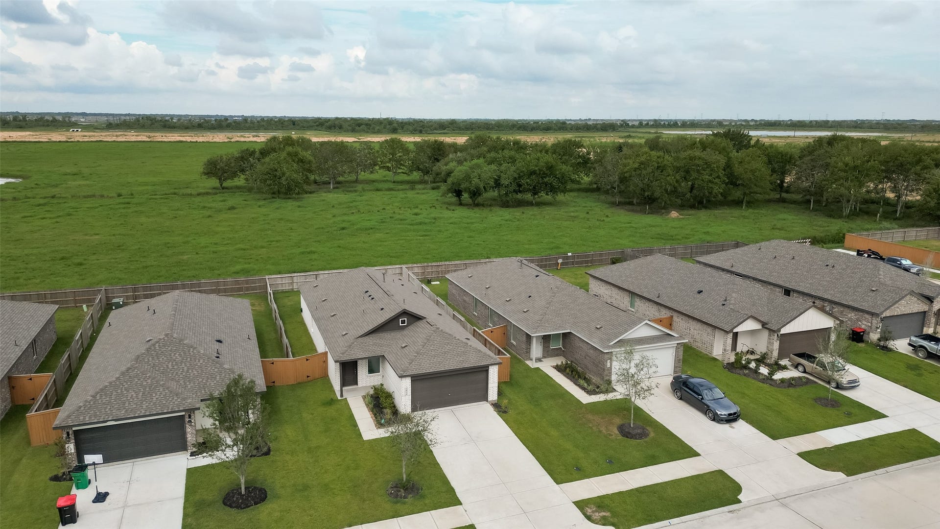 7814 Lavender Jade Drive, Rosharon, TX 77583 Aerial view capturing the residence and the adjacent greenspace, highlighting the property's privacy.