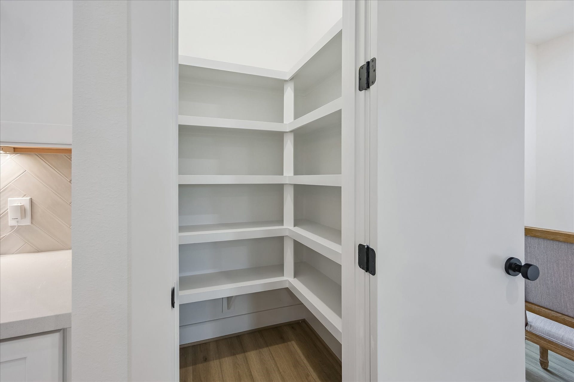 One of my favorite features is the walk-in pantry, offering plenty of room to keep everything neatly organized.
