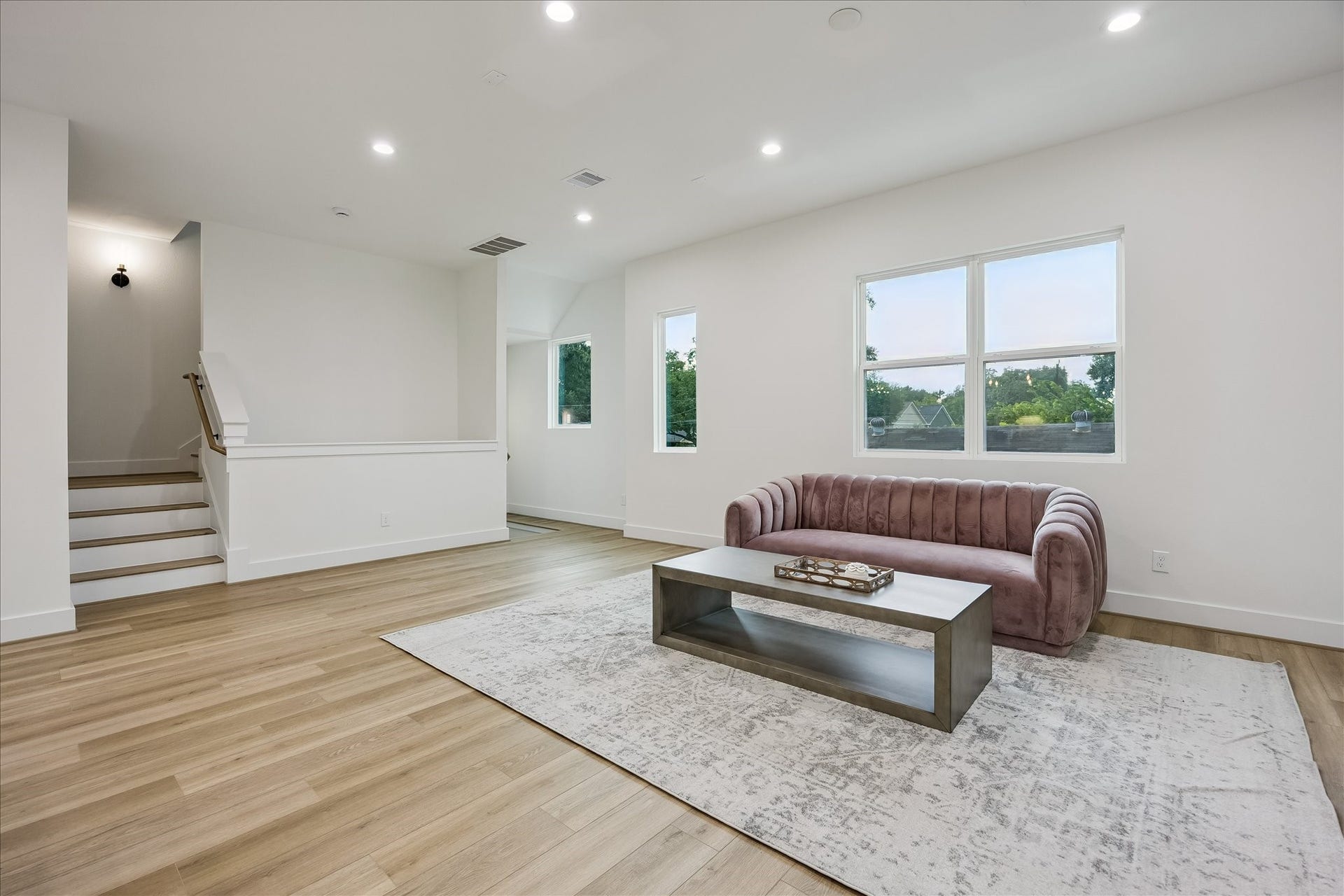 Before we make our way upstairs, take in one more view of this beautifully designed living space.