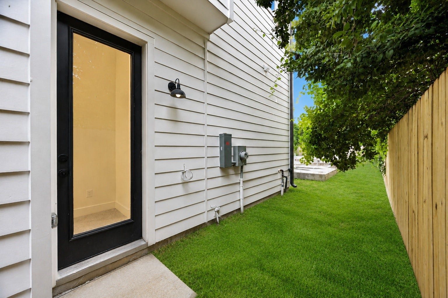 Here's the private backyard, which can easily be cross-fenced to create a separate outdoor space for pets or added privacy. Let's head back inside to continue the tour.